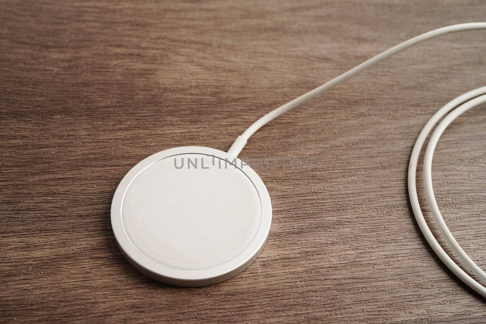 Wireless charger, magnetic charging modern equipment of mobile phone.