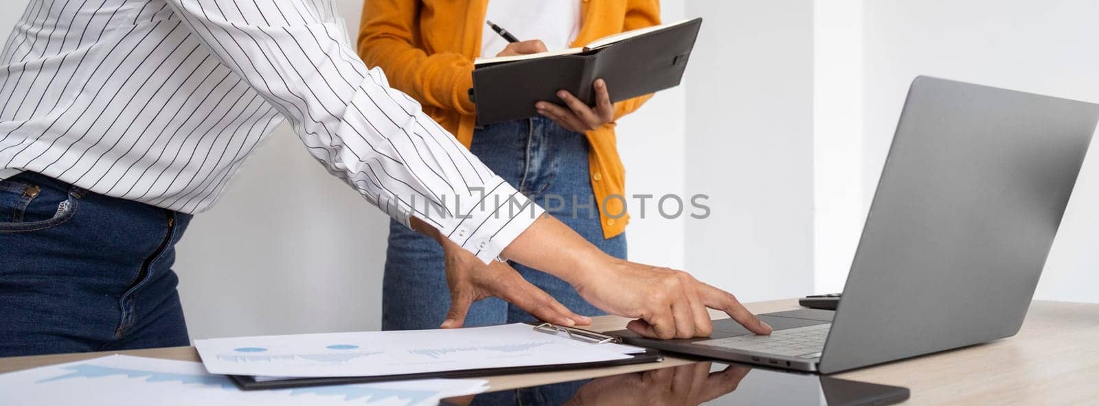 women thinking about new ideas work project laptop. High resolution photo