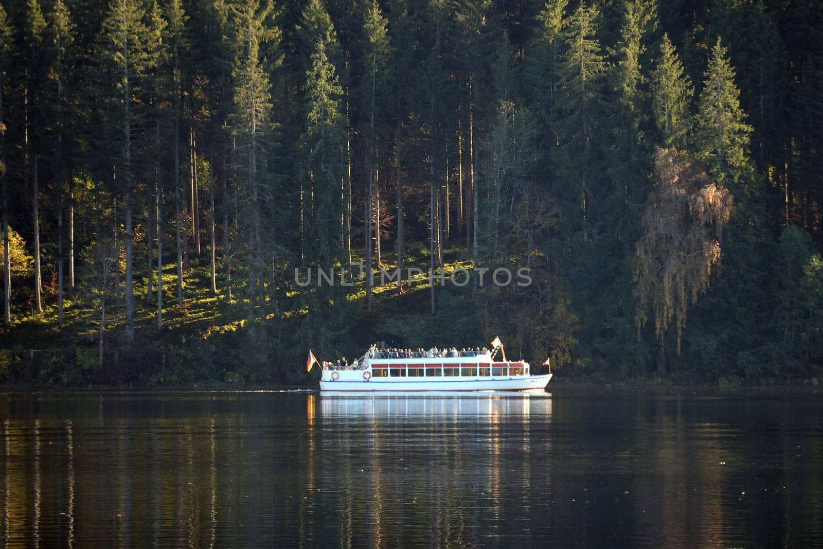 Fantastic autumn day at Lake Titisee (district-Breisgau-Hochschwarzwald). On the All Saints' Day holiday,countless excursionists from Germany and abroad took advantage of the mild late summer weather to take a trip to Lake Titisee with sunbathing on the lakeshore or to take a last trip on the large excursion boat on Lake Black Forest  Autumn atmosphere at the Isteiner Schwellen on the Rhine near Efringen-Kirchen (Lörrach district). In bright sunshine,numerous excursionists from Germany and abroad took advantage of the beautiful late summer weather on Sunday to take a trip to the Rhine.