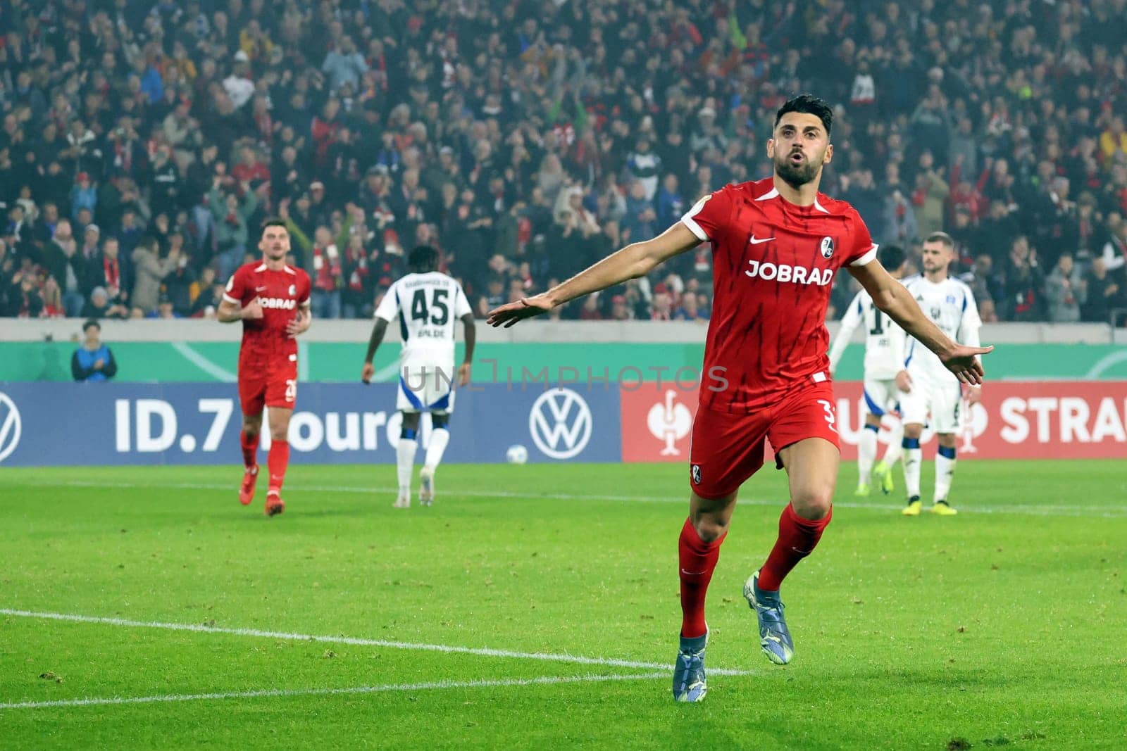 Vincenzo Grifo (SC Freiburg) scores from the penalty spot to make it 2-0 at half-time and celebrates his goal in the 2024-25 DFB-Pokal match,2nd round: SC Freiburg vs Hamburger SV