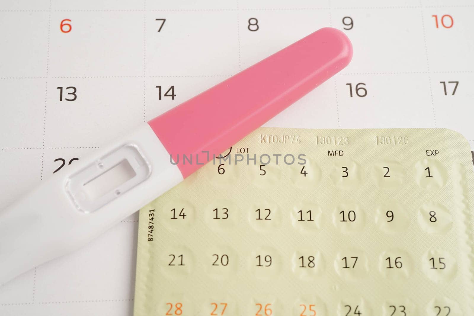 Pregnancy test with birth control pills for female of ovulation day, fetus, maternity, childbirth.