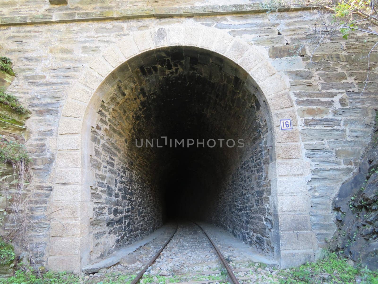 iron road bridges metal rail light at the end of the tunnel train transport