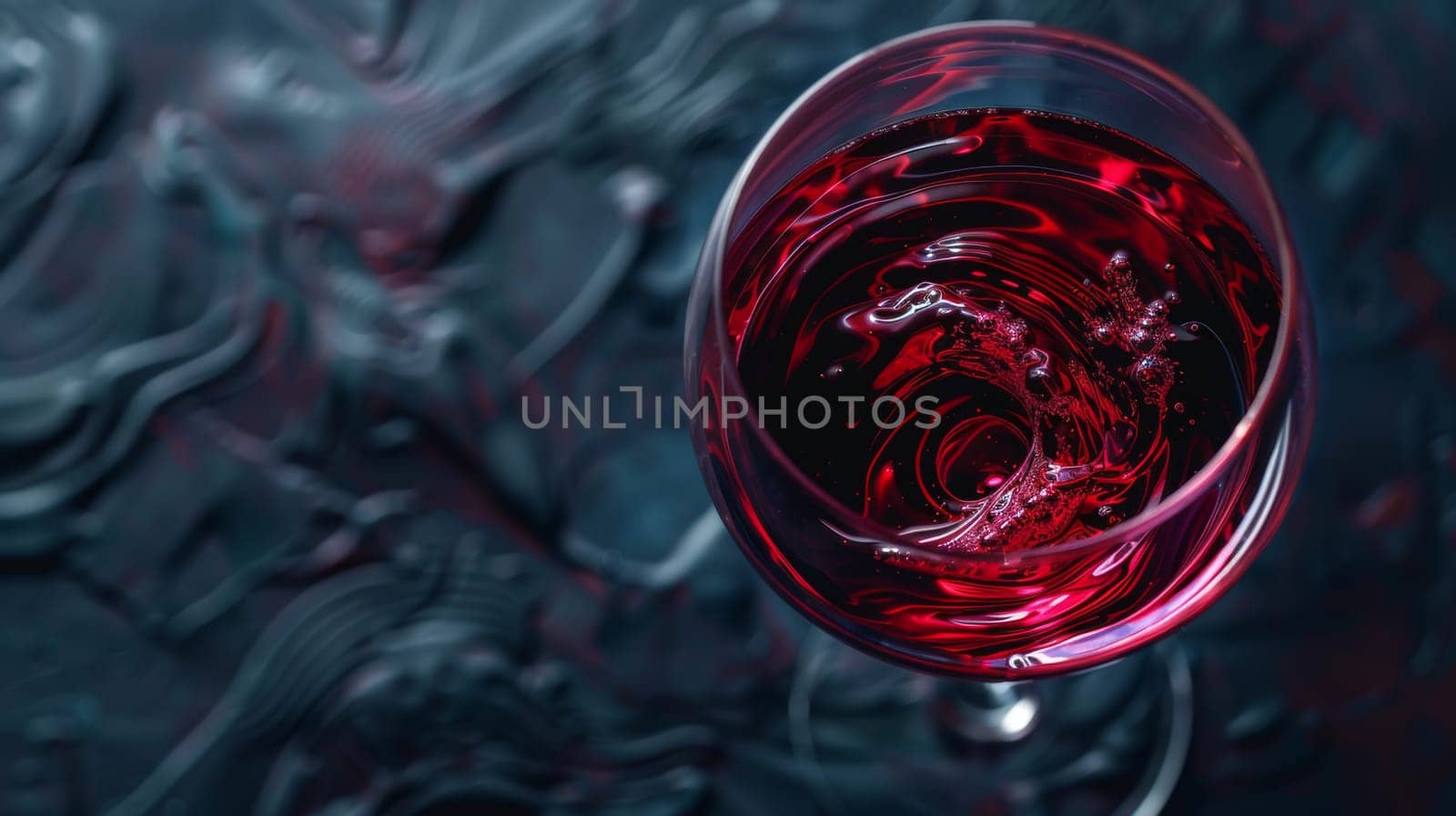 Glass of wine swirling with plenty of space for copy