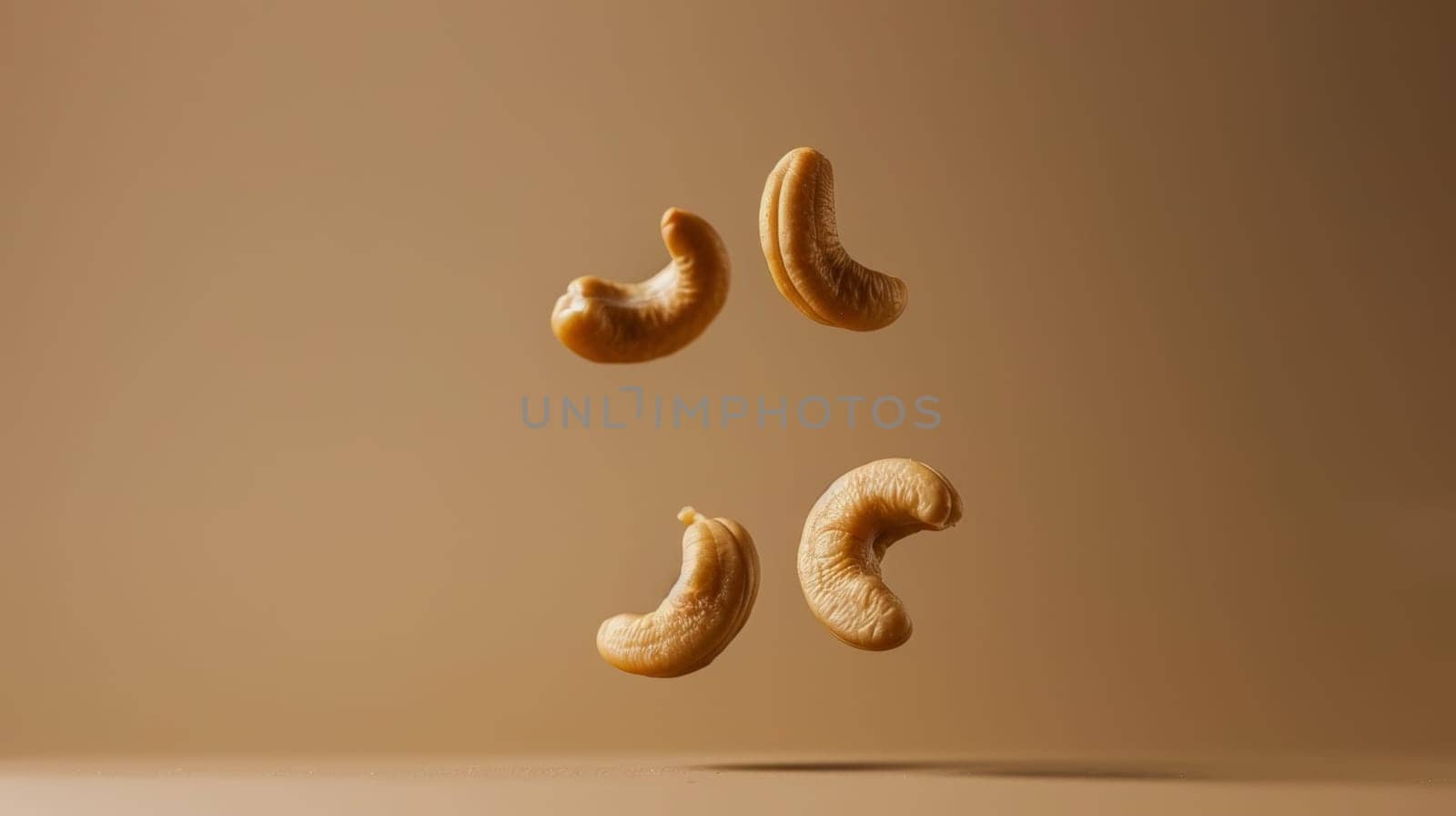Minimalist shot of floating cashew in a minimalist brown composition