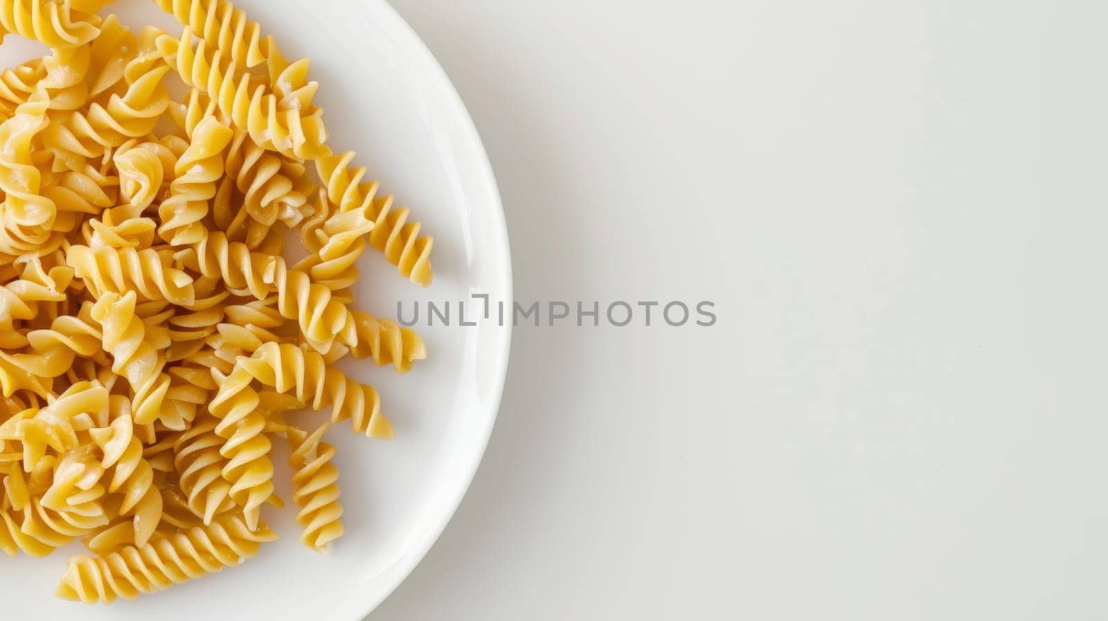 Spinning plate of pasta with a blank backdrop for text overlay