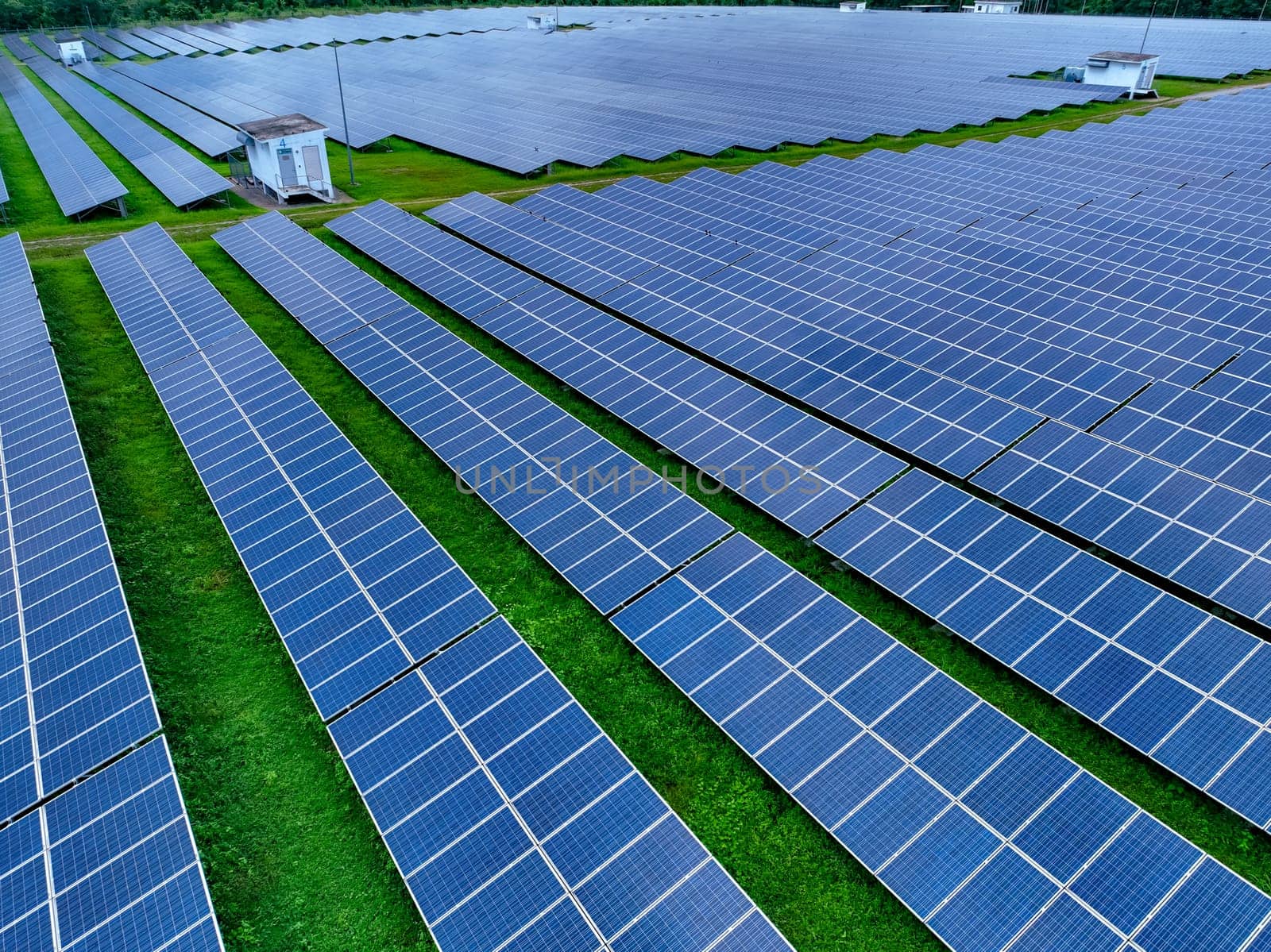 Aerial view of solar farm. Sustainable renewable energy and modern photovoltaic technology for eco-friendly electricity production. Solar power station. Green energy solutions. Solar panel technology.