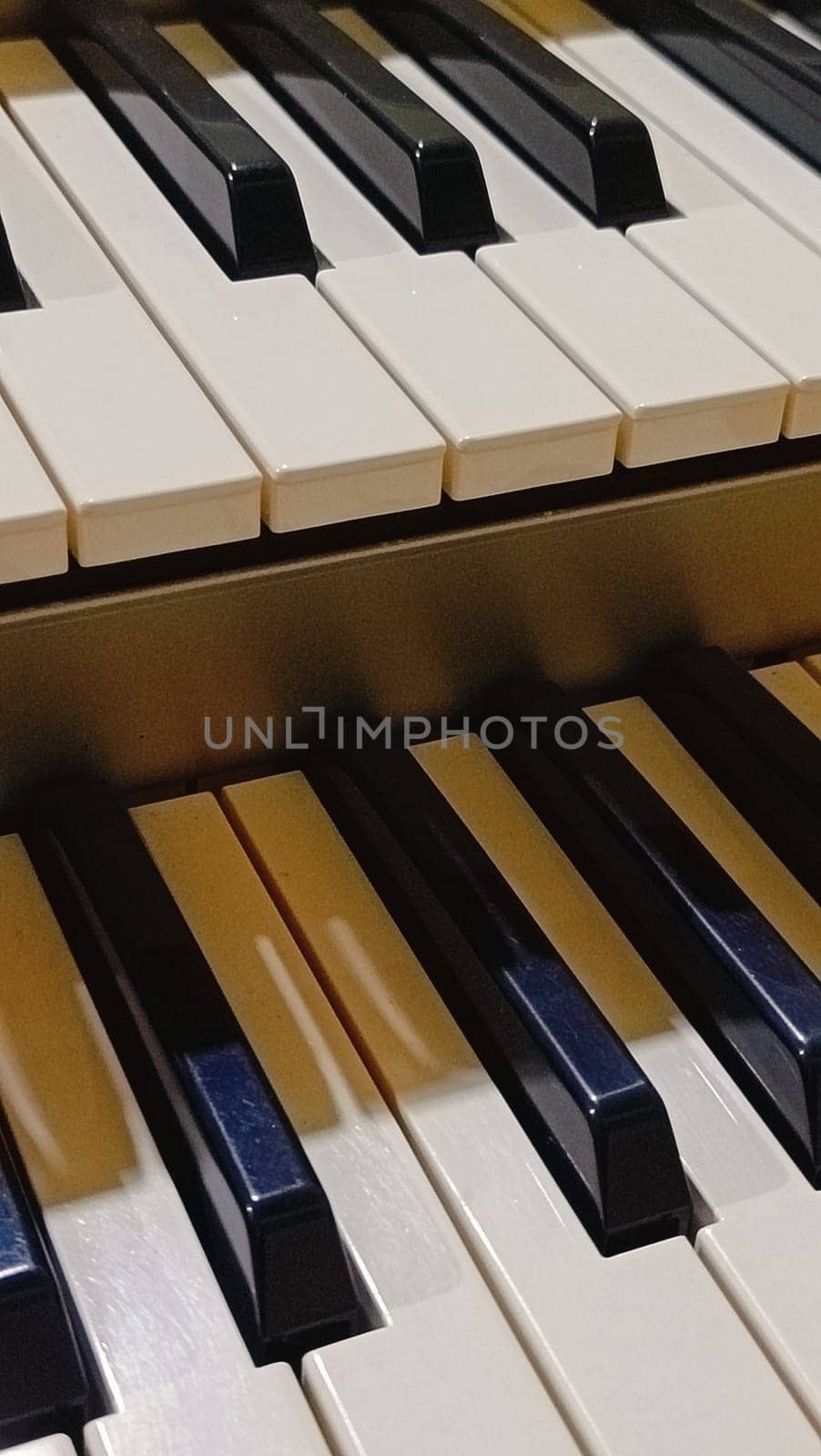 Close-up of an electronic organ in a cozy music room.