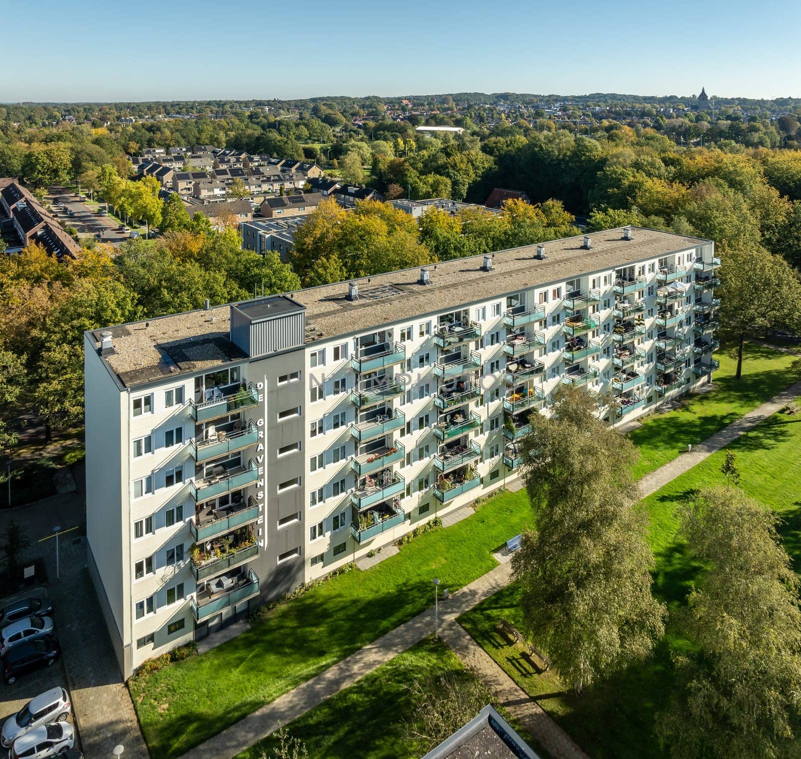 aerial view of a residential area in the netherlands with a few apartment buildings