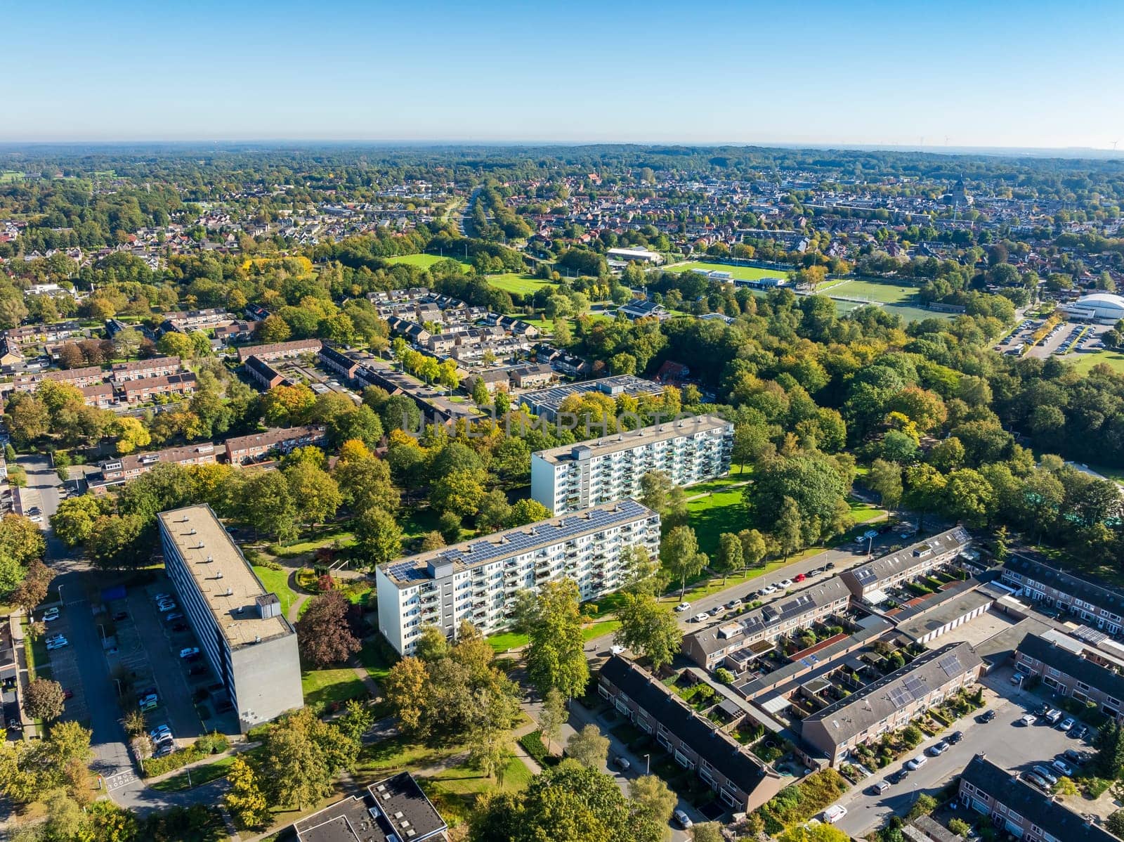 aerial view of a residential area in the netherlands with a few apartment buildings