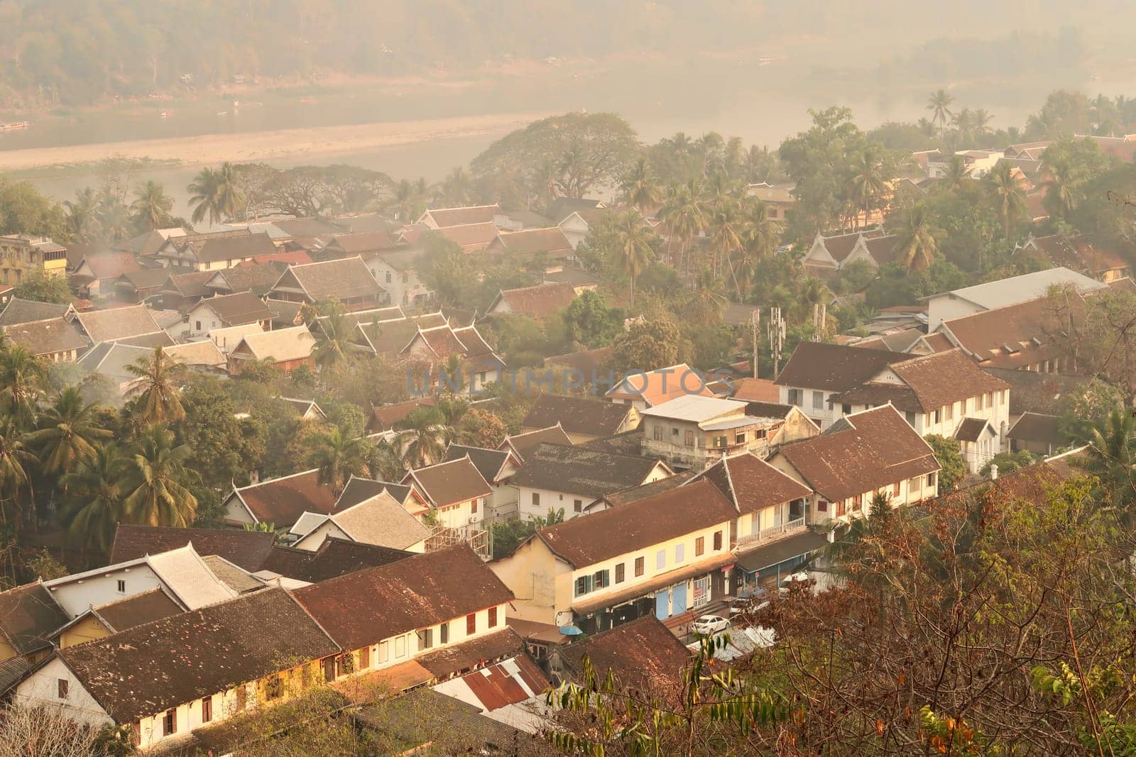 View from Phousi Hill onto the old town with the Mekong River in the background, Luang Prabang, Laos 2023