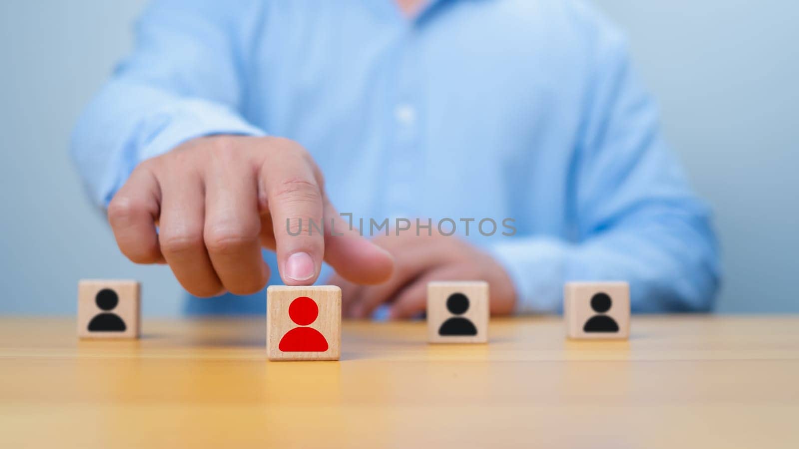 Recruitment employee and talent management with Successful business team leader concept, Business recruiter with one person shown with wooden cubes with icons, Personal auditing or CRM concept.
