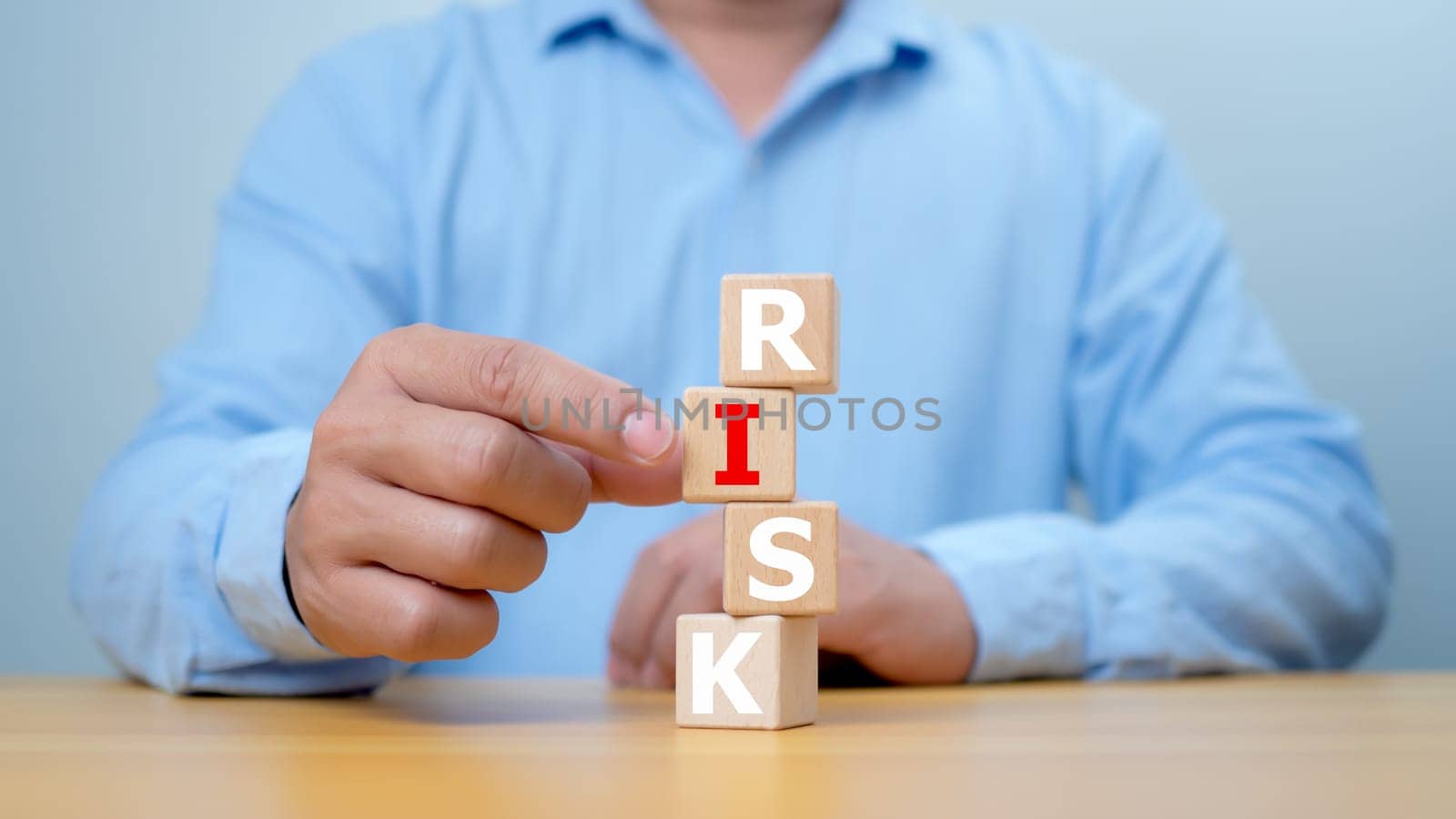 Risk management concept, RISK word print on wooden block on coins money with up arrow and percent for financial banking increase interest rate or investment dividend from, Investment Safety.