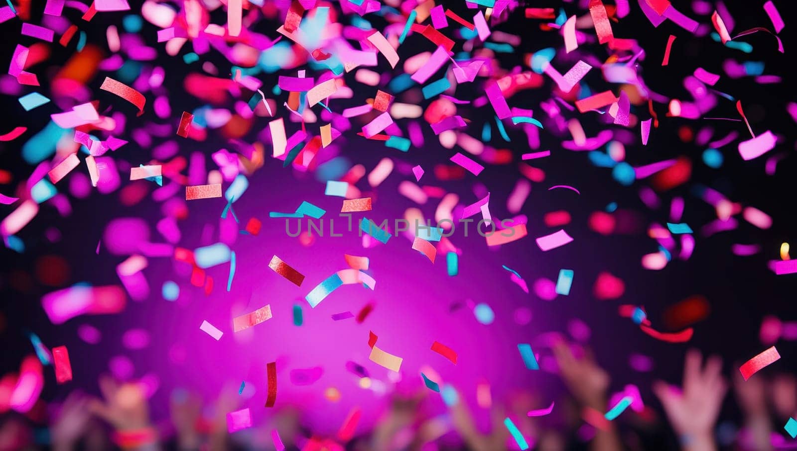 Colorful confetti falling at a celebration event. Concept of joy and festivity.