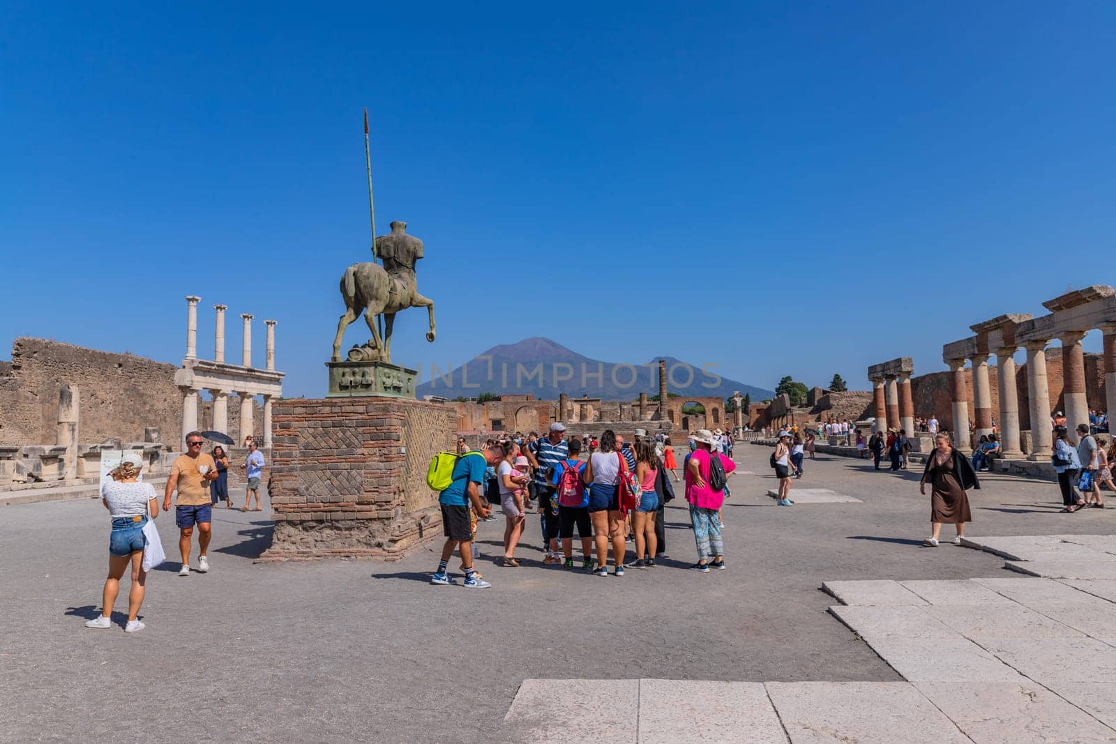 Pompeii, Italy - August 8, 2024: Ruins of a city. Pompeii is an ancient Roman city died from the eruption of Mount Vesuvius in 79 AD.