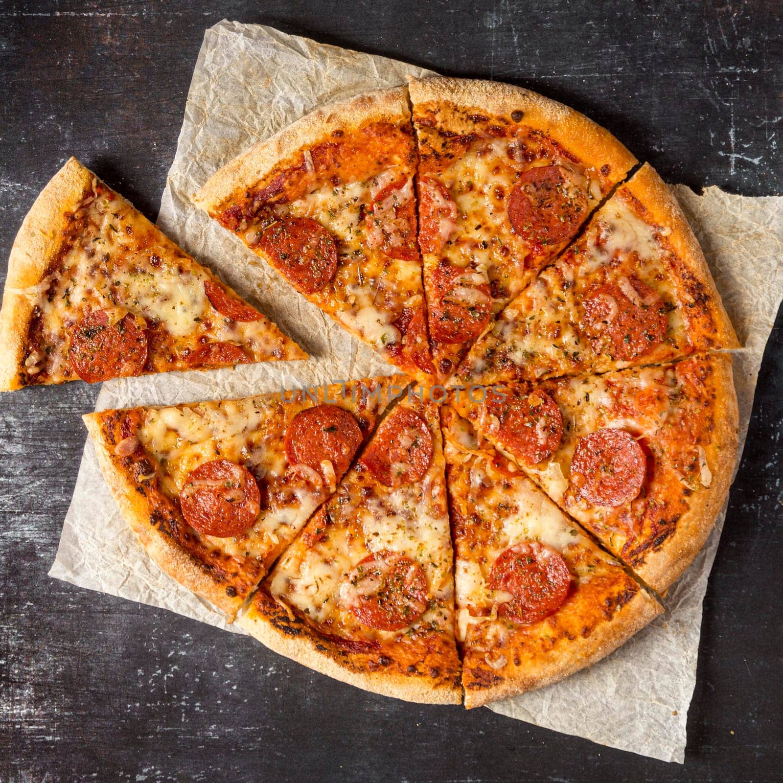 flat lay slices salami pizza. High resolution photo
