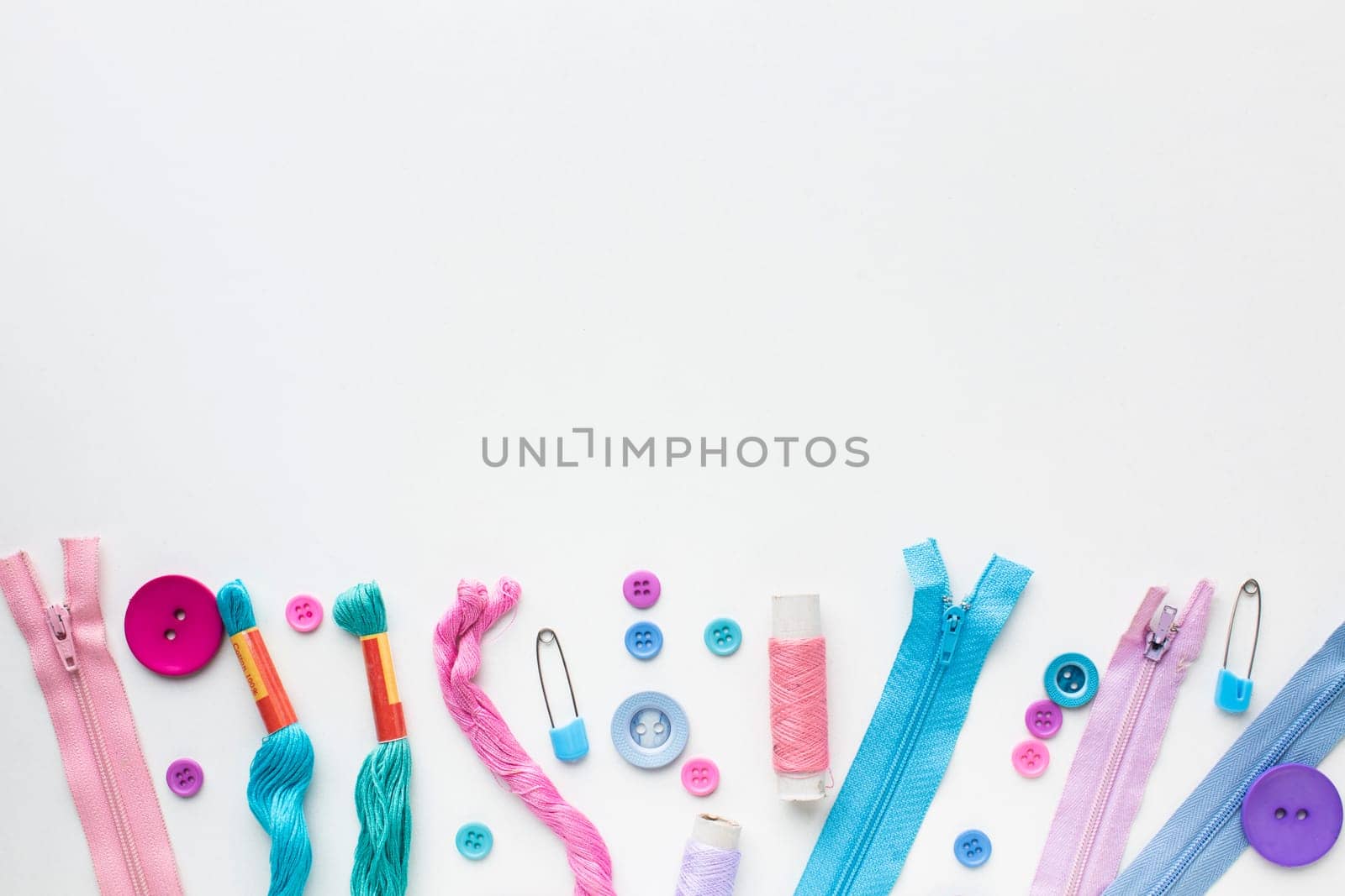 haberdashery colourful accessories frame with buttons zipper. High resolution photo