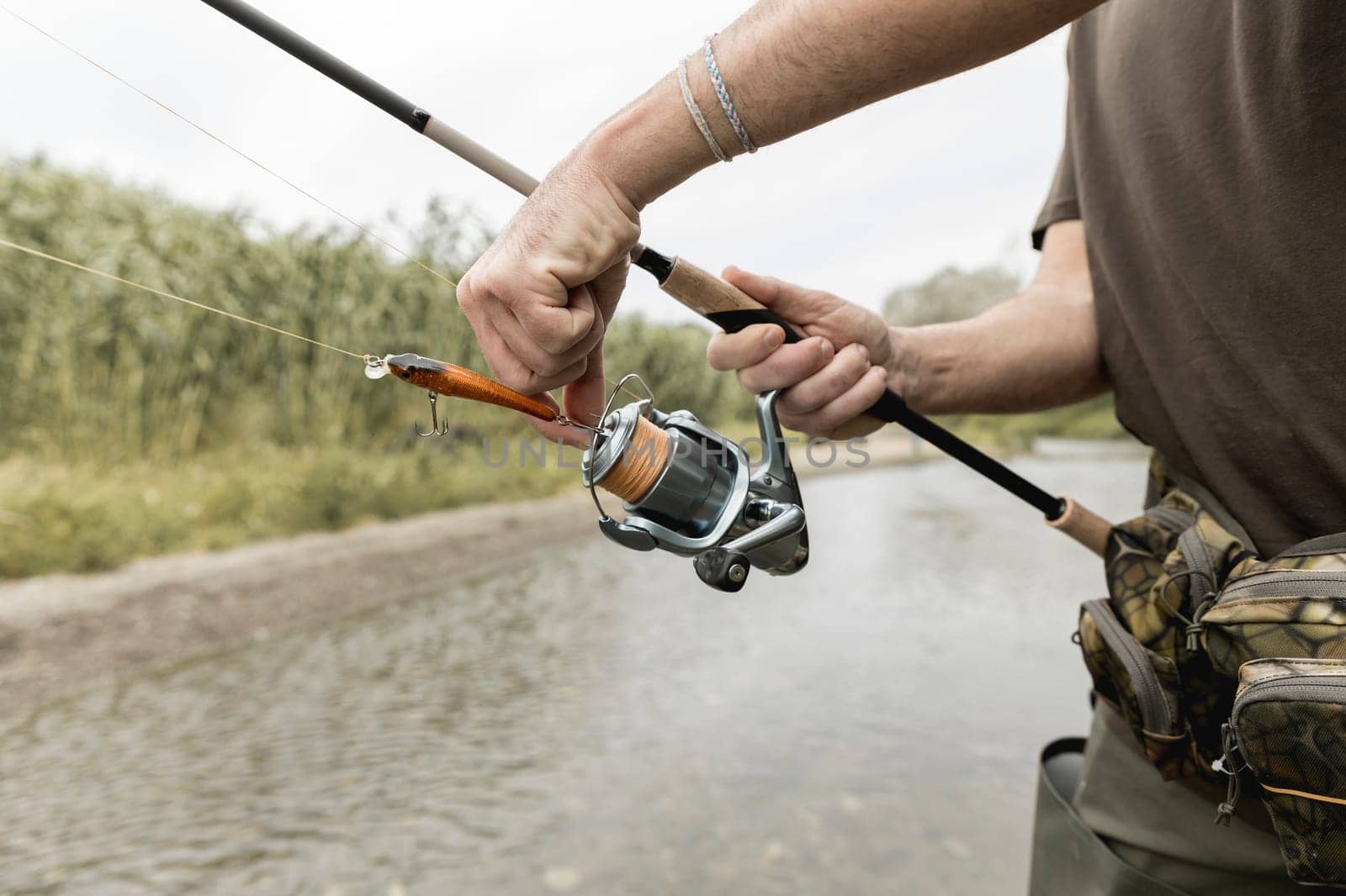 man fishing river. High resolution photo