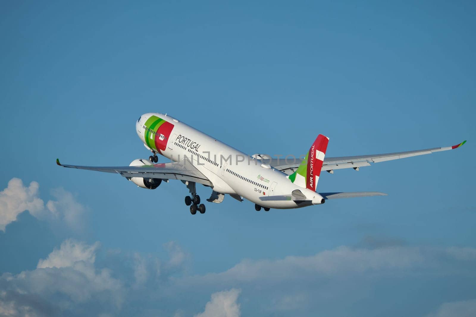 Lisbon, Portugal - September 2, 2023: TAP Air Portugal Airbus A330-941 passenger plane in sky after take off in Humberto Delgado Airport in Lisbon