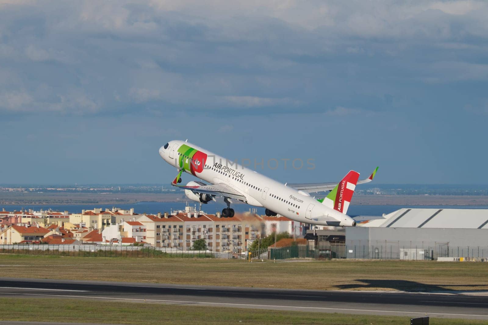 Lisbon, Portugal - September 2, 2023: TAP Air Portugal Airbus A321-251NX passenger plane take off in Humberto Delgado Airport in Lisbon
