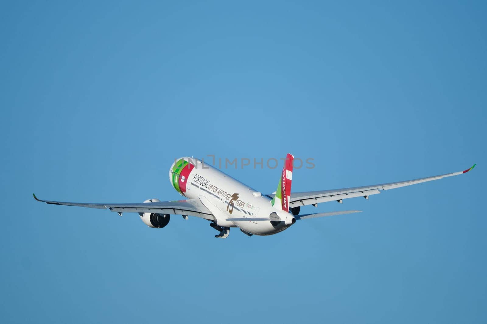 Lisbon, Portugal - September 2, 2023: TAP Air Portugal Airbus A330-941 passenger plane in sky after take off in Humberto Delgado Airport in Lisbon