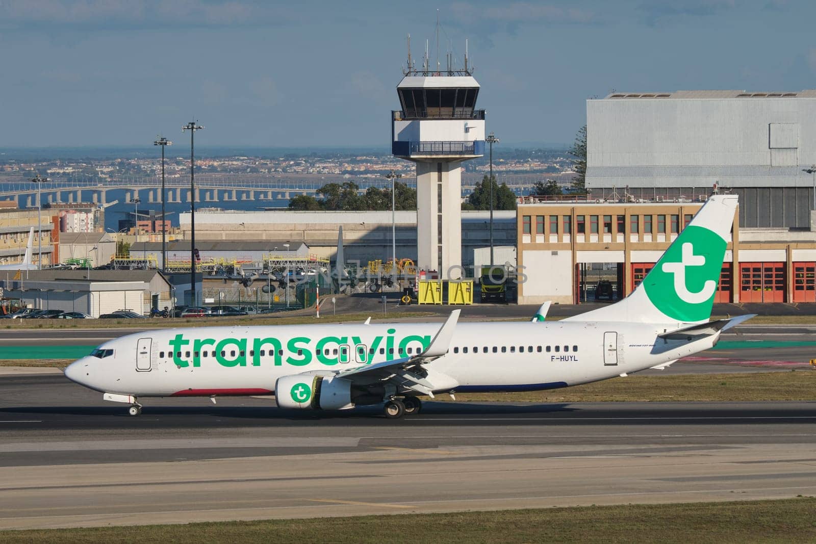 Lisbon, Portugal - September 2, 2023: Transavia Boeing 737-86N passenger plane taxi on runway in Humberto Delgado Airport in Lisbon