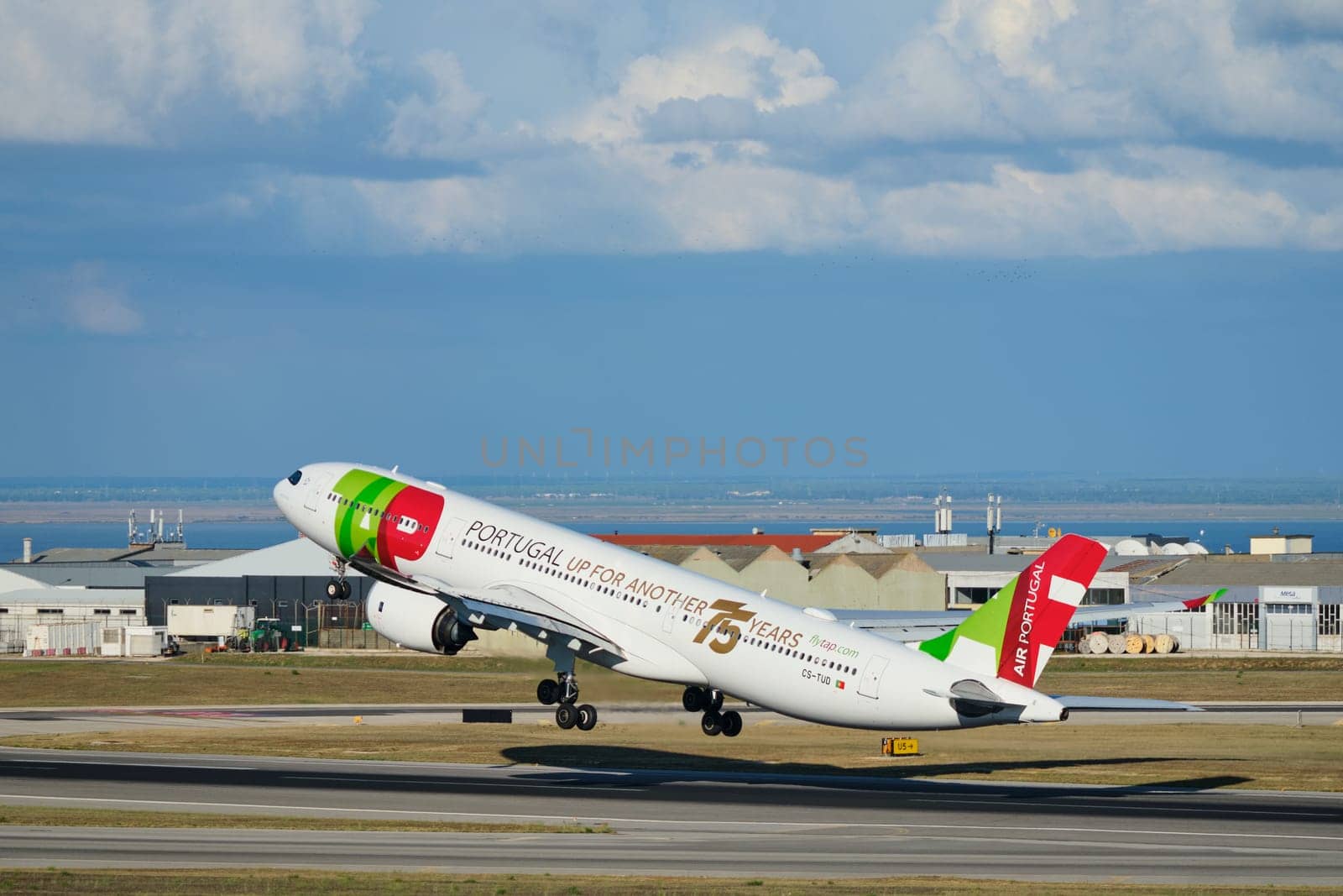 Lisbon, Portugal - September 2, 2023: TAP Air Portugal Airbus A330-941 passenger plane take off in Humberto Delgado Airport in Lisbon