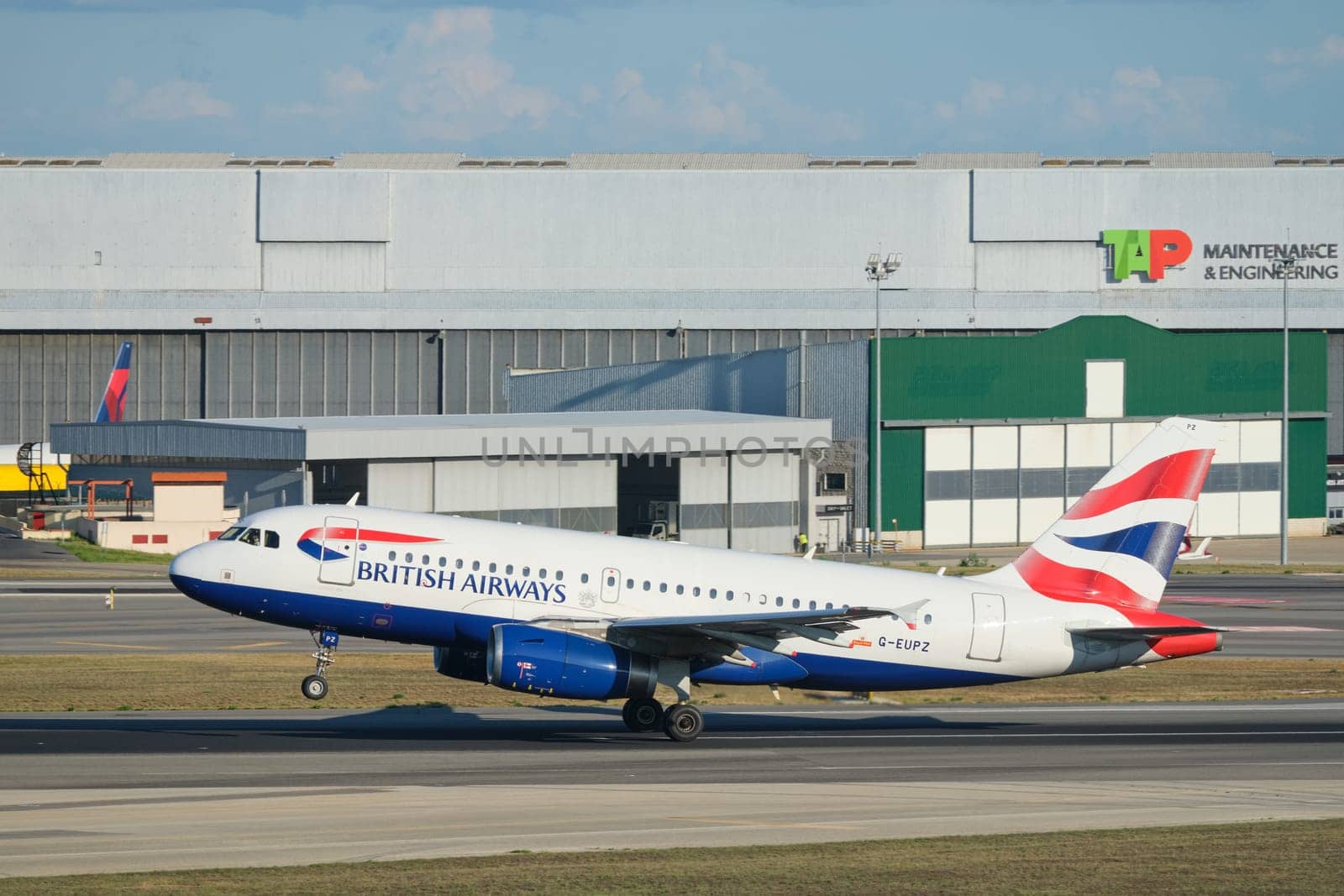 Lisbon, Portugal - September 2, 2023: British Airways Airbus A319-131 passenger plane take off in Humberto Delgado Airport in Lisbon