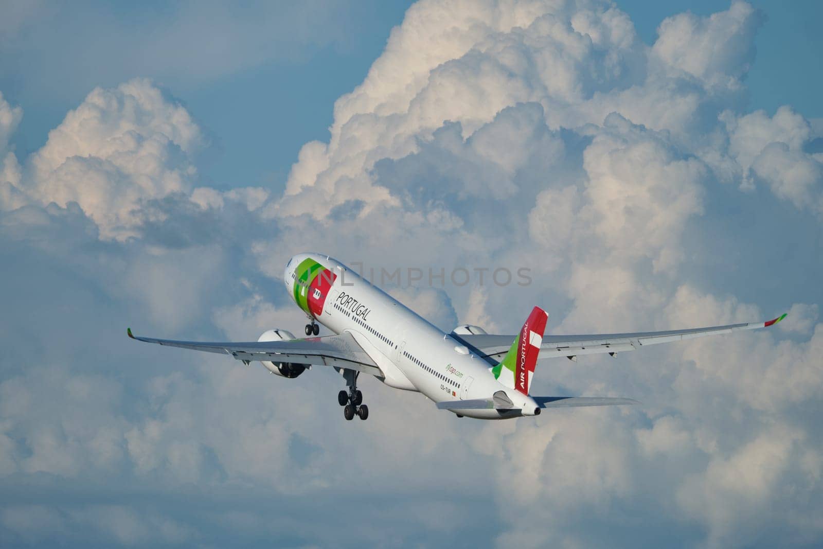 Lisbon, Portugal - September 2, 2023: TAP Air Portugal Airbus A330-941 passenger plane in sky after take off in Humberto Delgado Airport in Lisbon