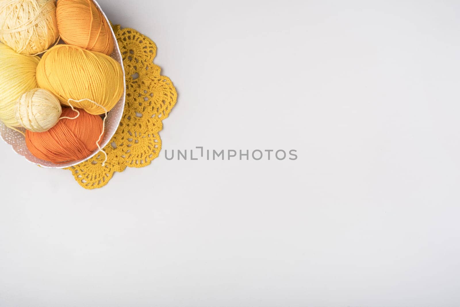 basket with wool yarn copy space. High resolution photo