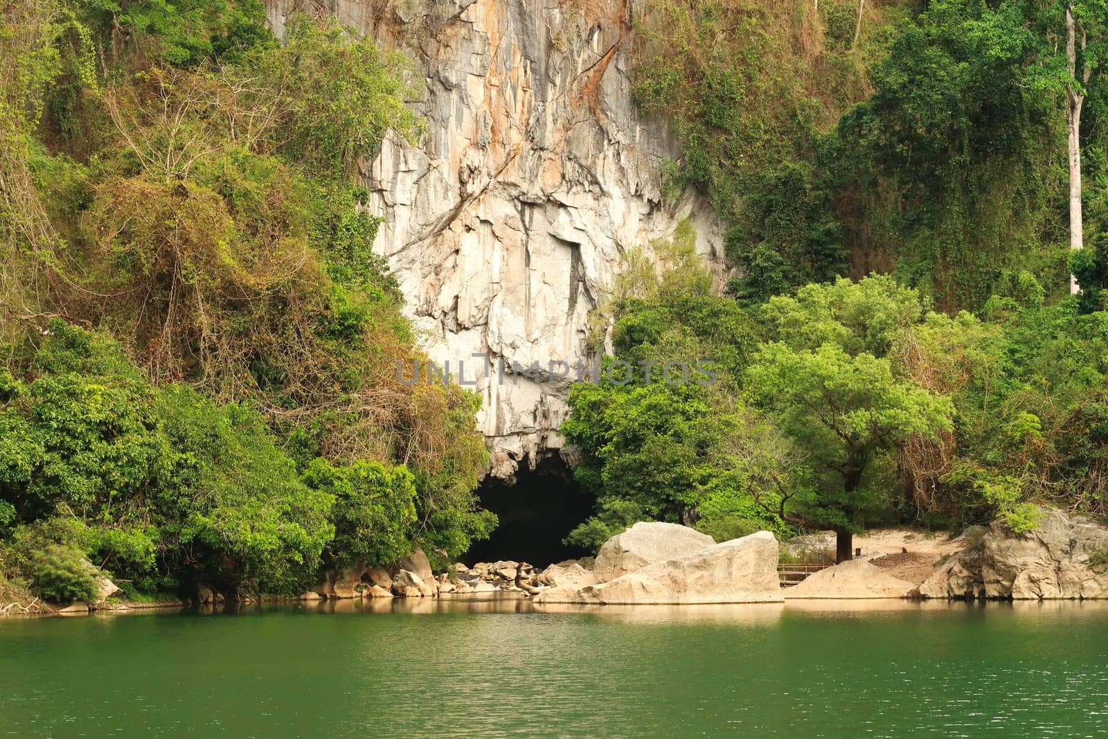 View onto the entrance of the Kong Lor Cave, a tourist attraction on the Thakhek Motorbike Loop, Laos 2023