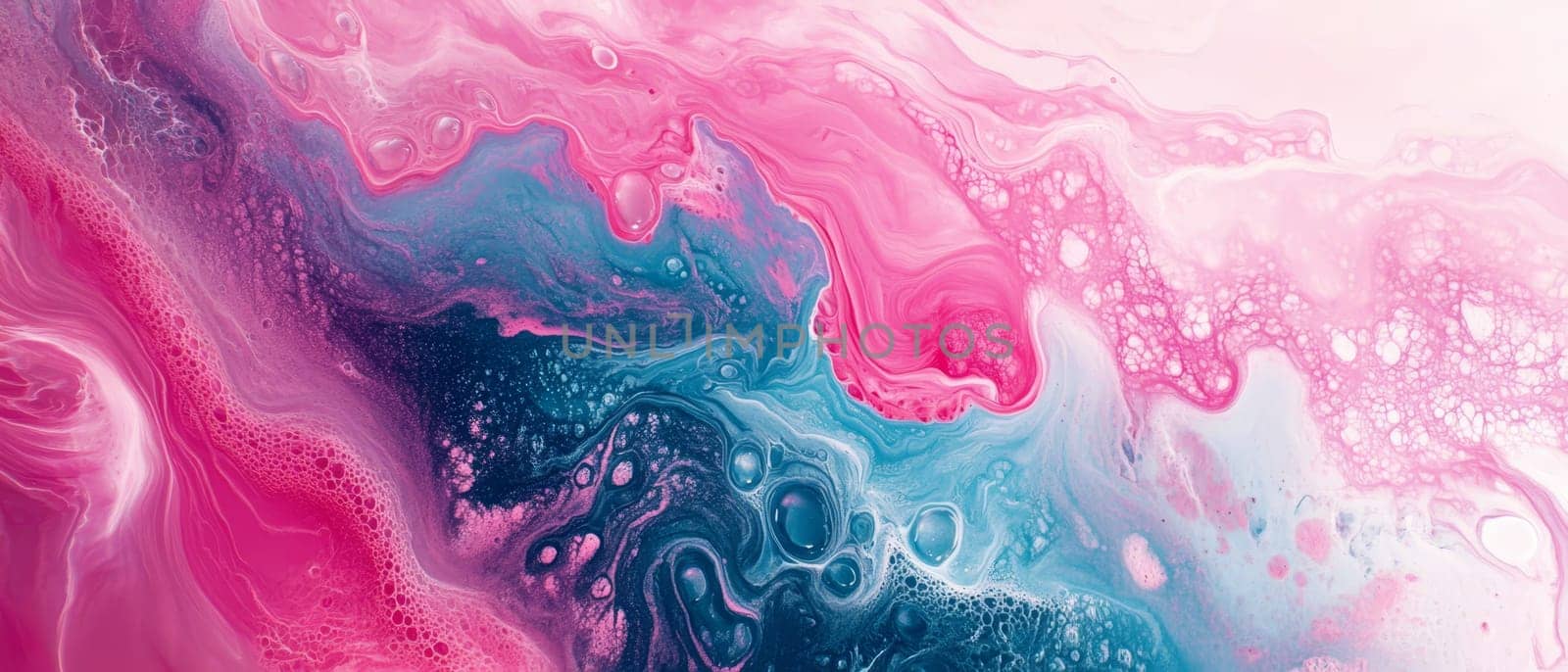 Vibrant abstract fluid art with swirling pink and blue hues, creating a mesmerizing pattern of colors and textures.
