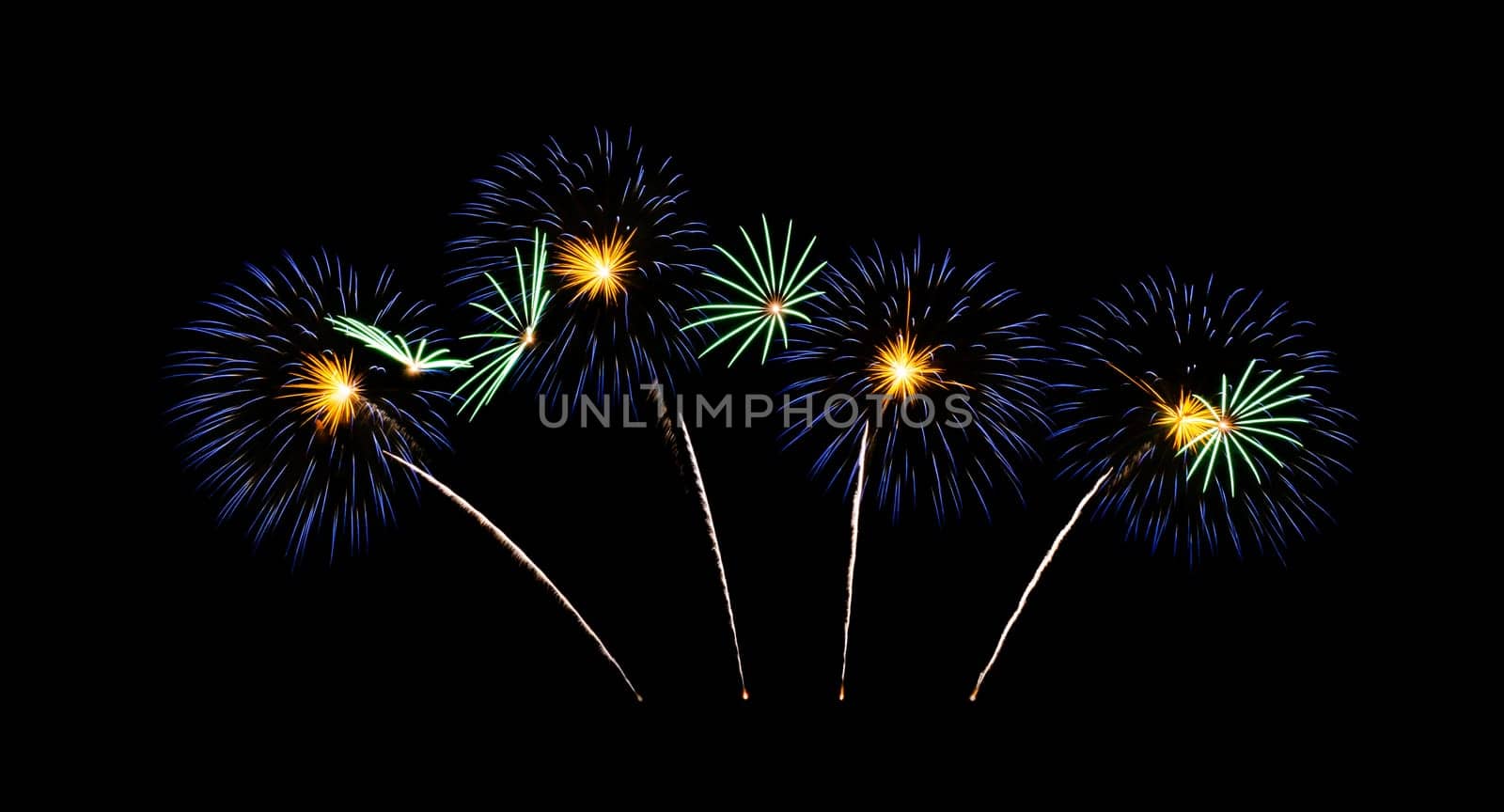 Beautiful blue fireworks exploding on night sky. Celebration and anniversary concept.