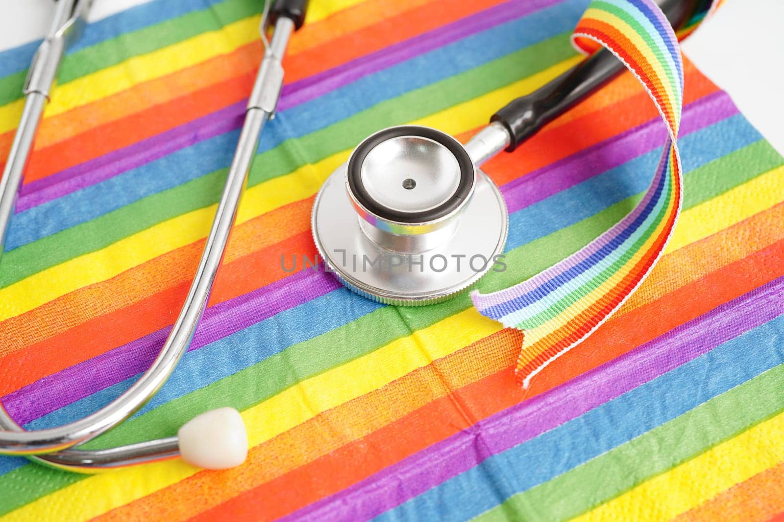 LGBT symbol, Stethoscope on rainbow flag, rights and gender equality, LGBT Pride Month in June.