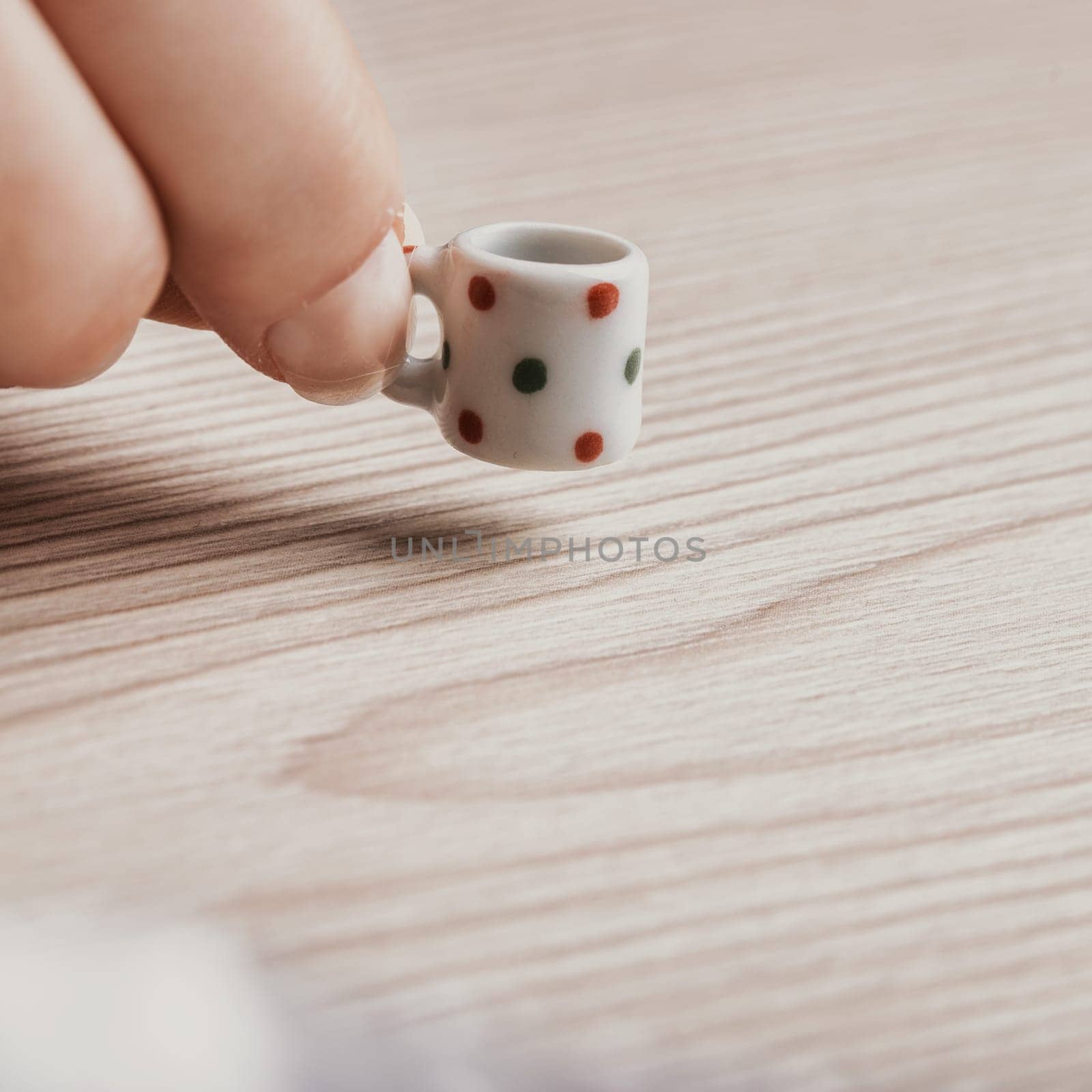 Microscopically small coffee cup highlights feelings of lack and limitation. Dietary restrictions, lactose intolerance, and financial limits all contribute to a missing sense of fulfillment in breakfa