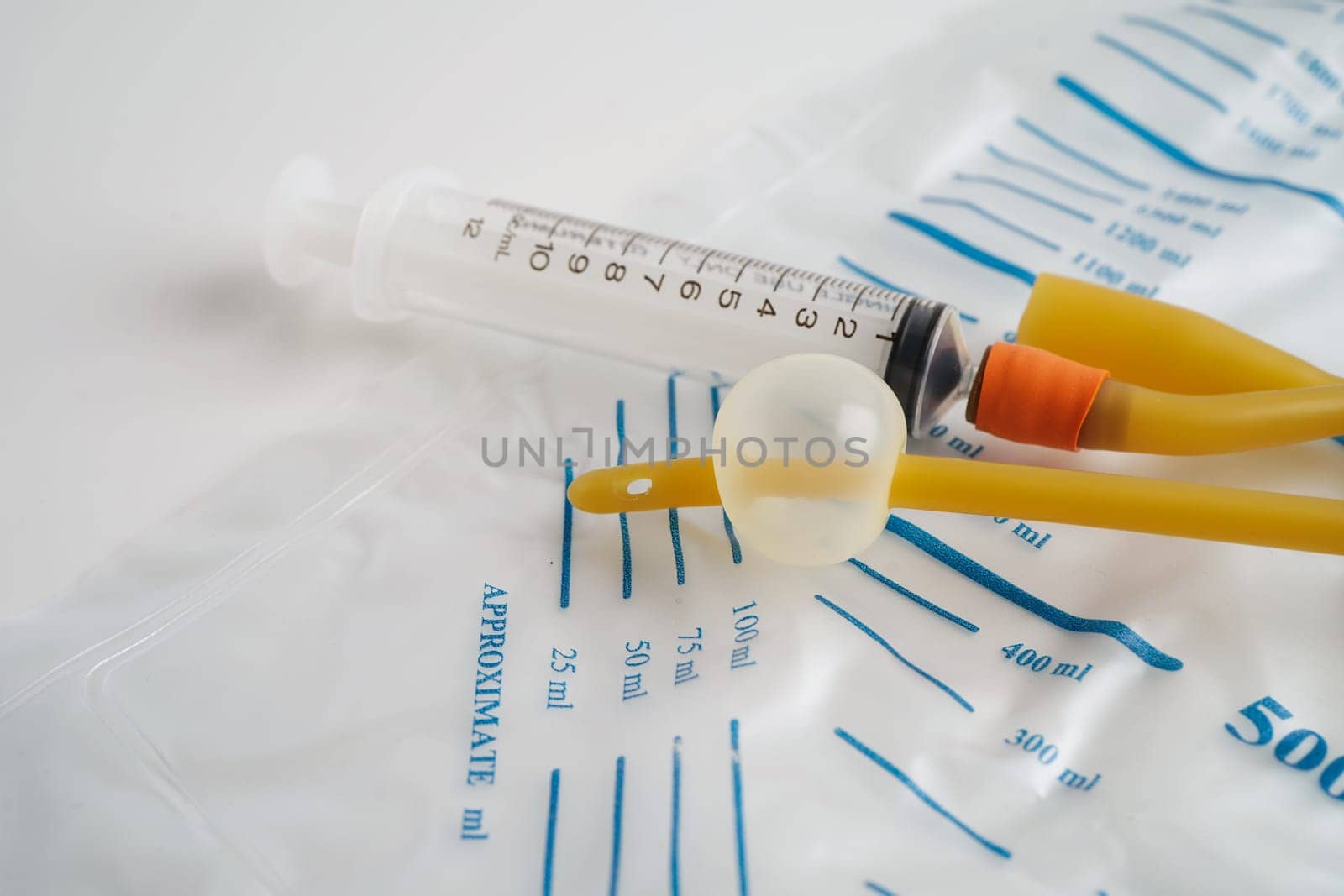 Foley catheter and urine drainage bag collect urine for disability or patient in hospital.