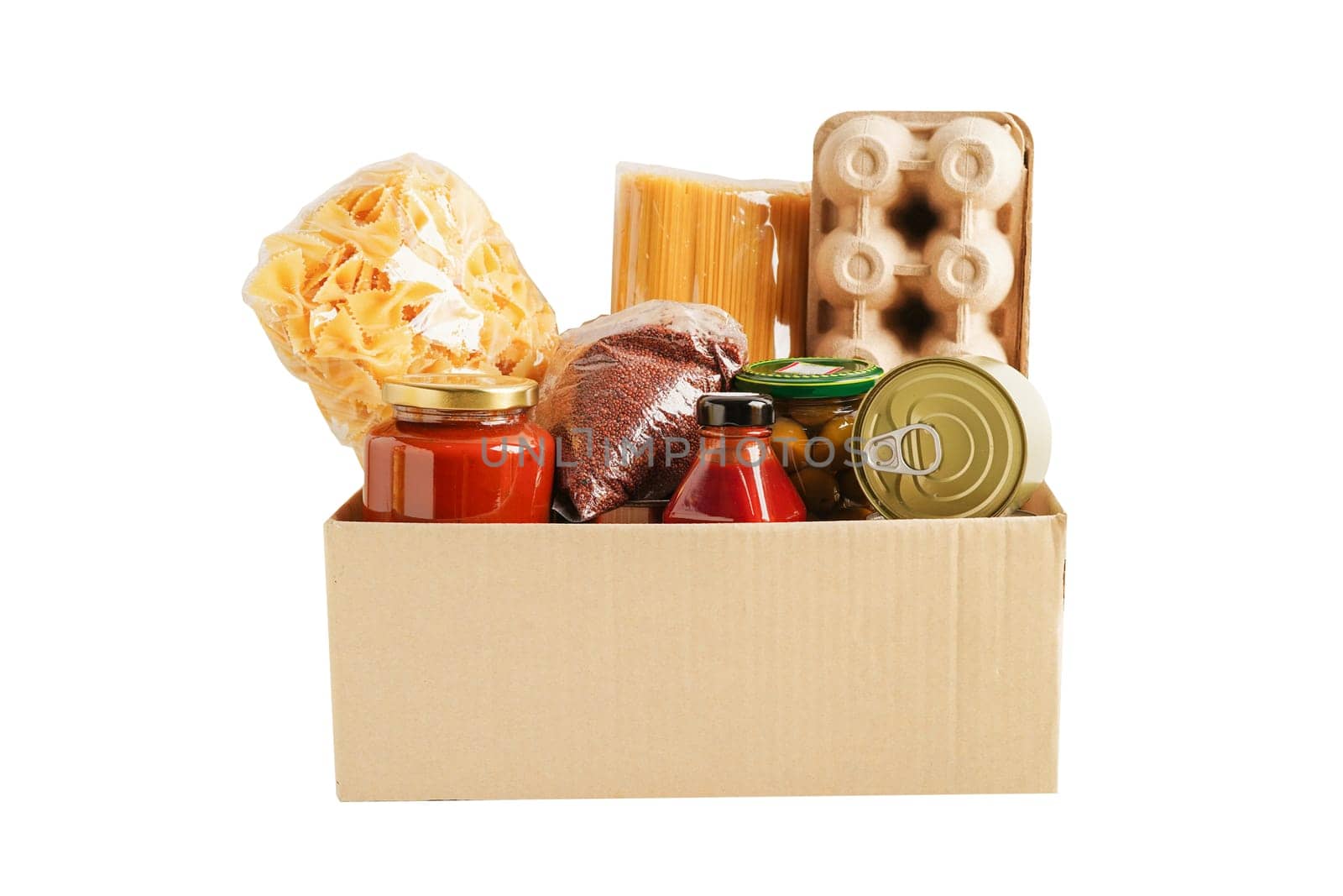 Foodstuffs in donation box isolated on white background with clipping path for volunteer to help people.