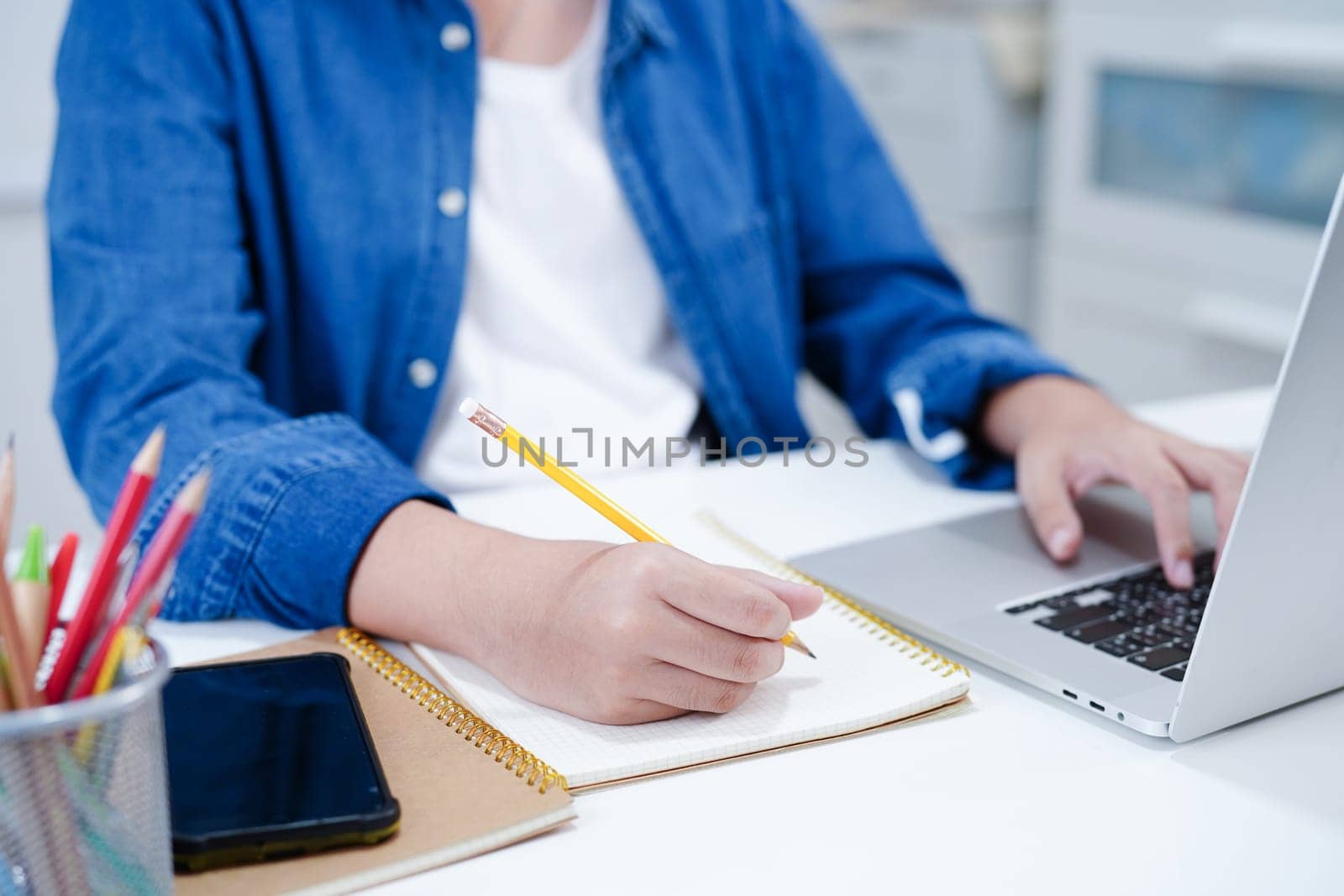Teenage using smart phone for communication, search data internet website to learn.
