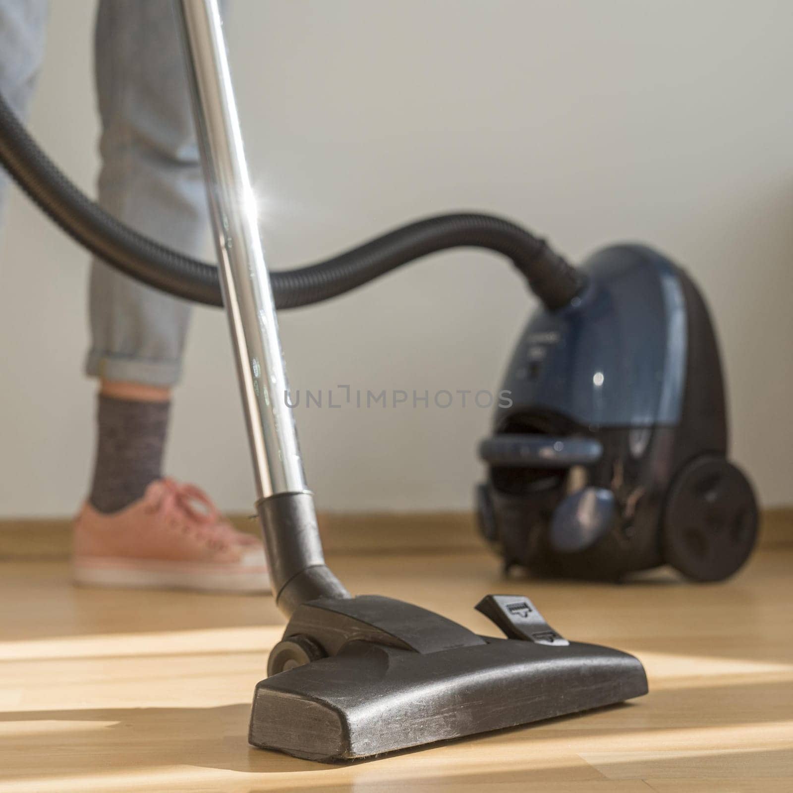woman cleaning room with vacuum cleaner. Resolution and high quality beautiful photo