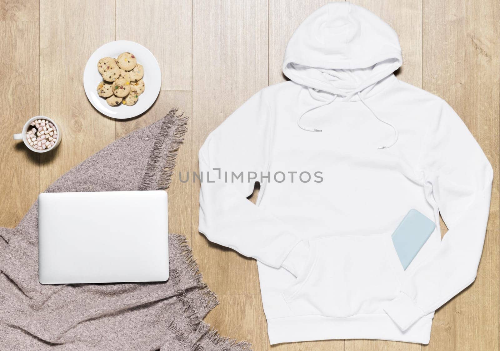 white hoodie with cookies plate laptop. Resolution and high quality beautiful photo