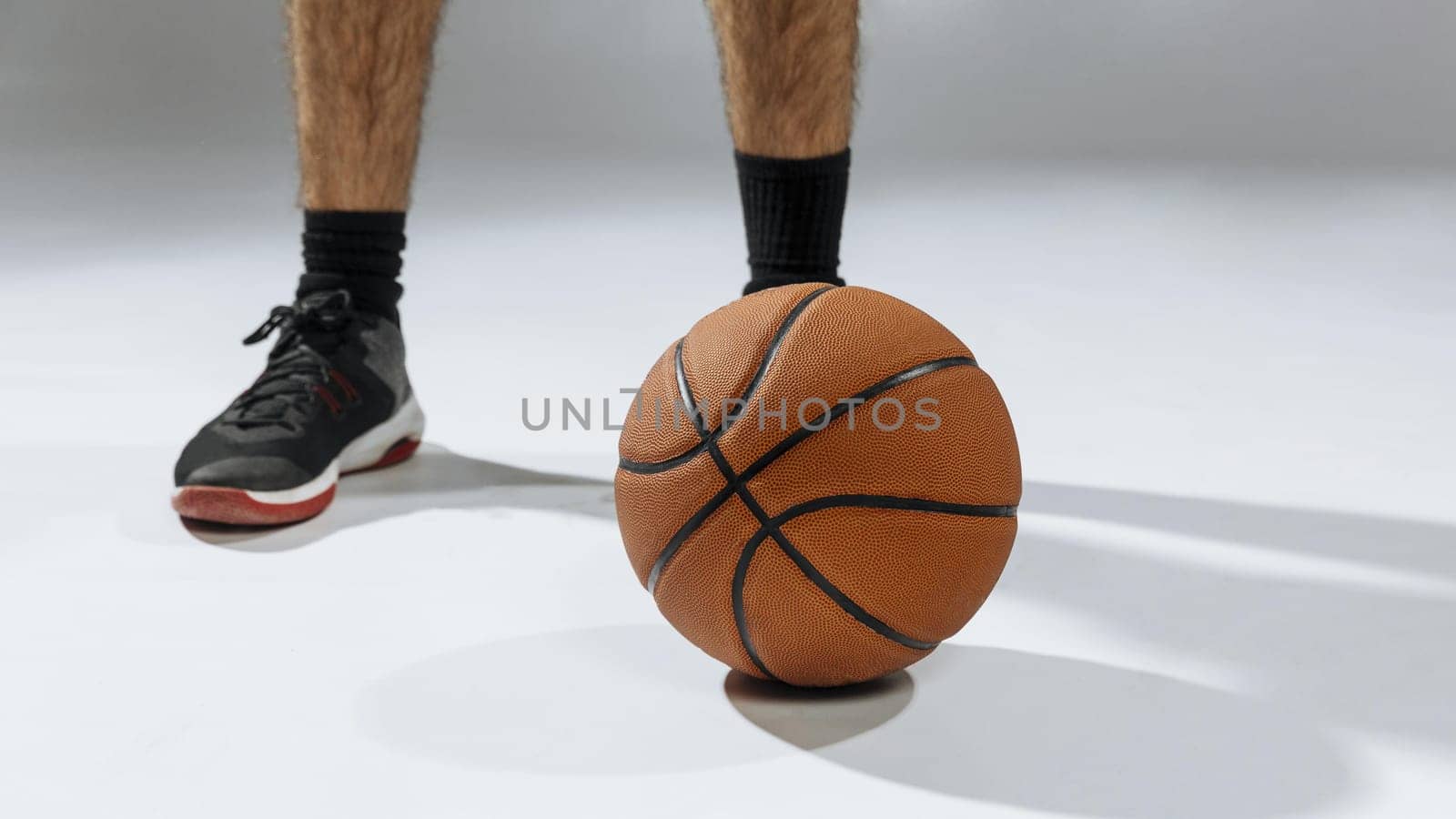 young man s feet playing basketball. Resolution and high quality beautiful photo