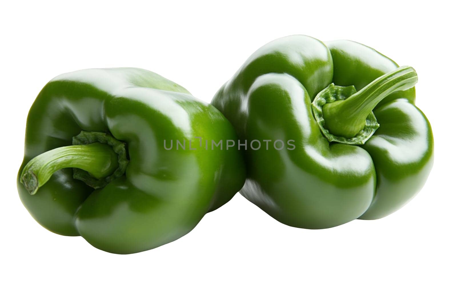 A duo of glossy green bell peppers, highlighting their vibrant color and smooth texture on a plain background. Isolated on white background.