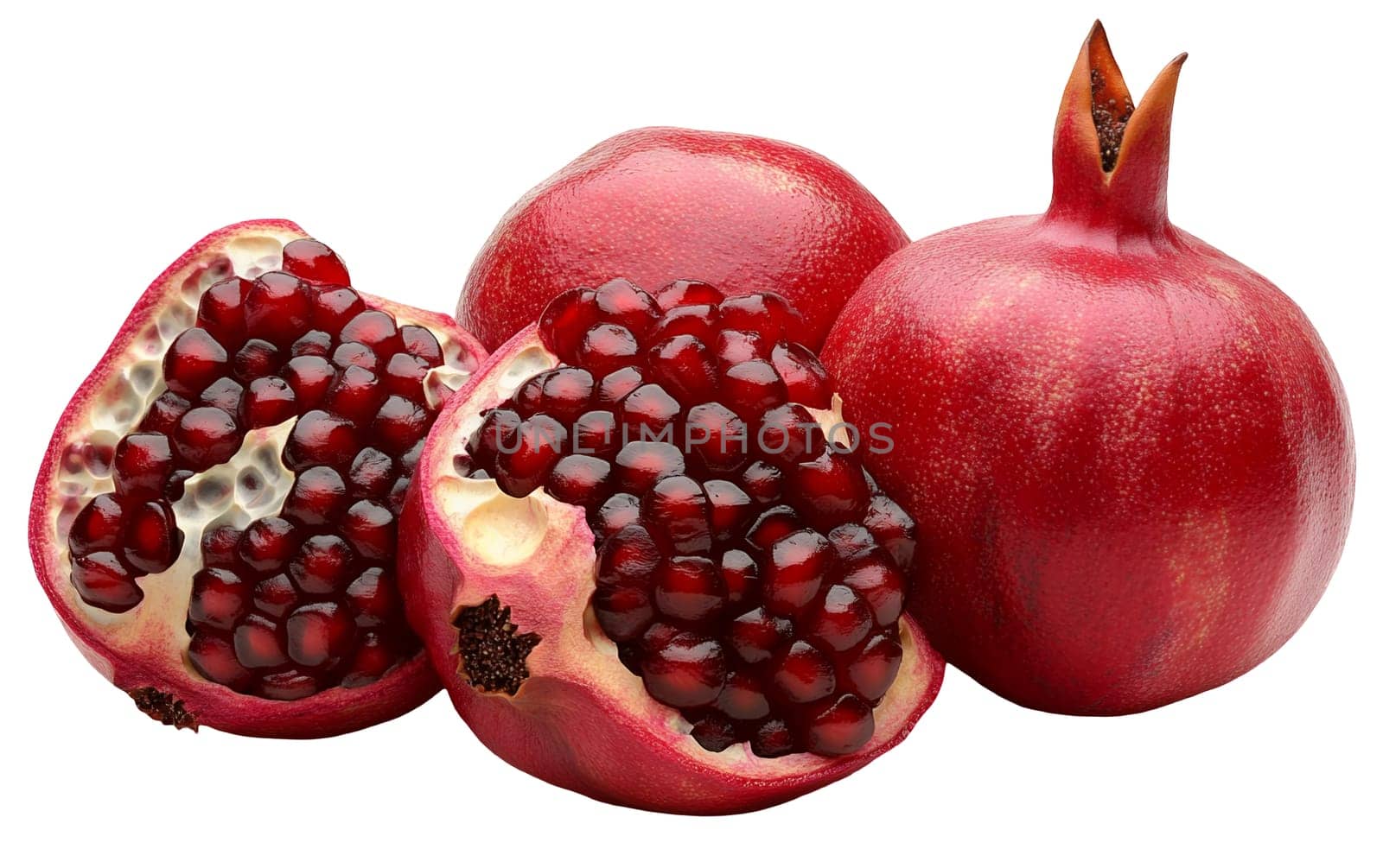 Juicy pomegranates and seeds displayed on a white background, highlighting their vibrant red color and freshness. Isolated on white background.