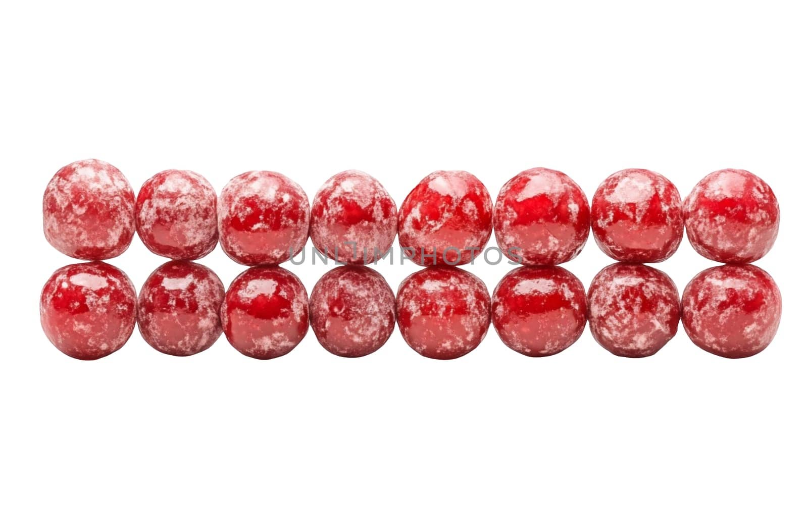 A row of glossy red candied cherries covered in a light sugar coating, arranged neatly on a white background. Isolated on white background.