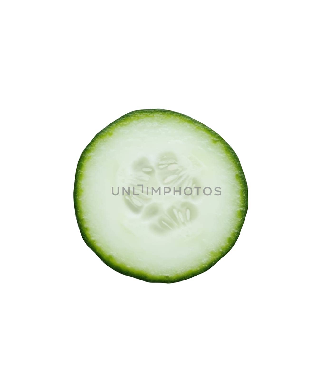 A fresh cucumber slice shows its crisp texture and light green color, isolated on a white background. Isolated on white background.