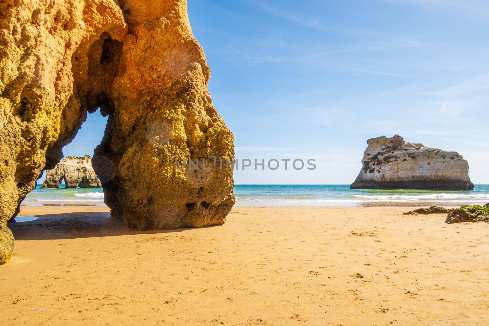 Beach and rugged coastline, photographed in the Algarve region, south of Portugal