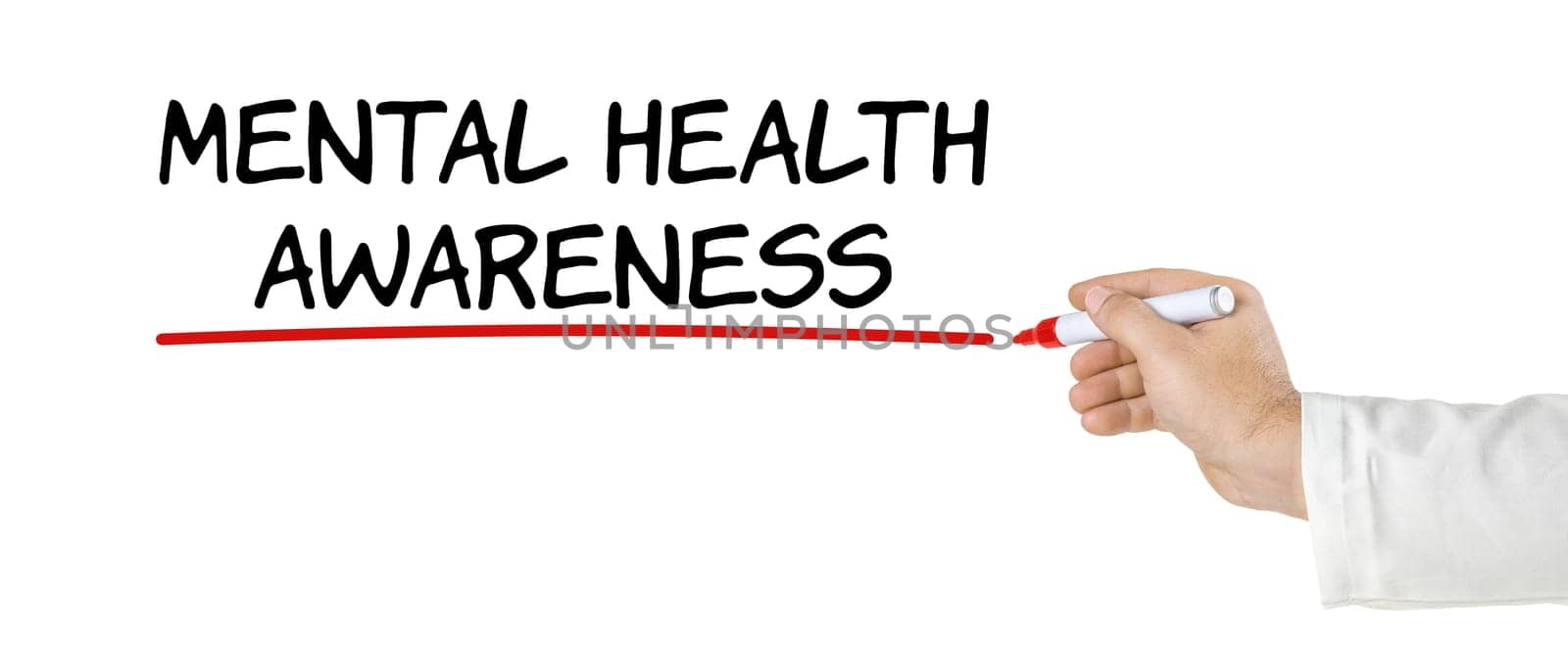 Hand with pen writing Mental Health awareness