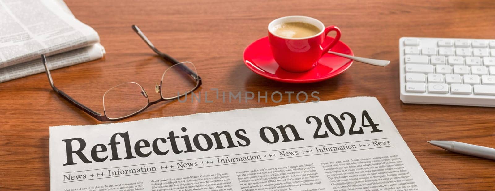 A newspaper on a wooden desk - Reflections on 2024