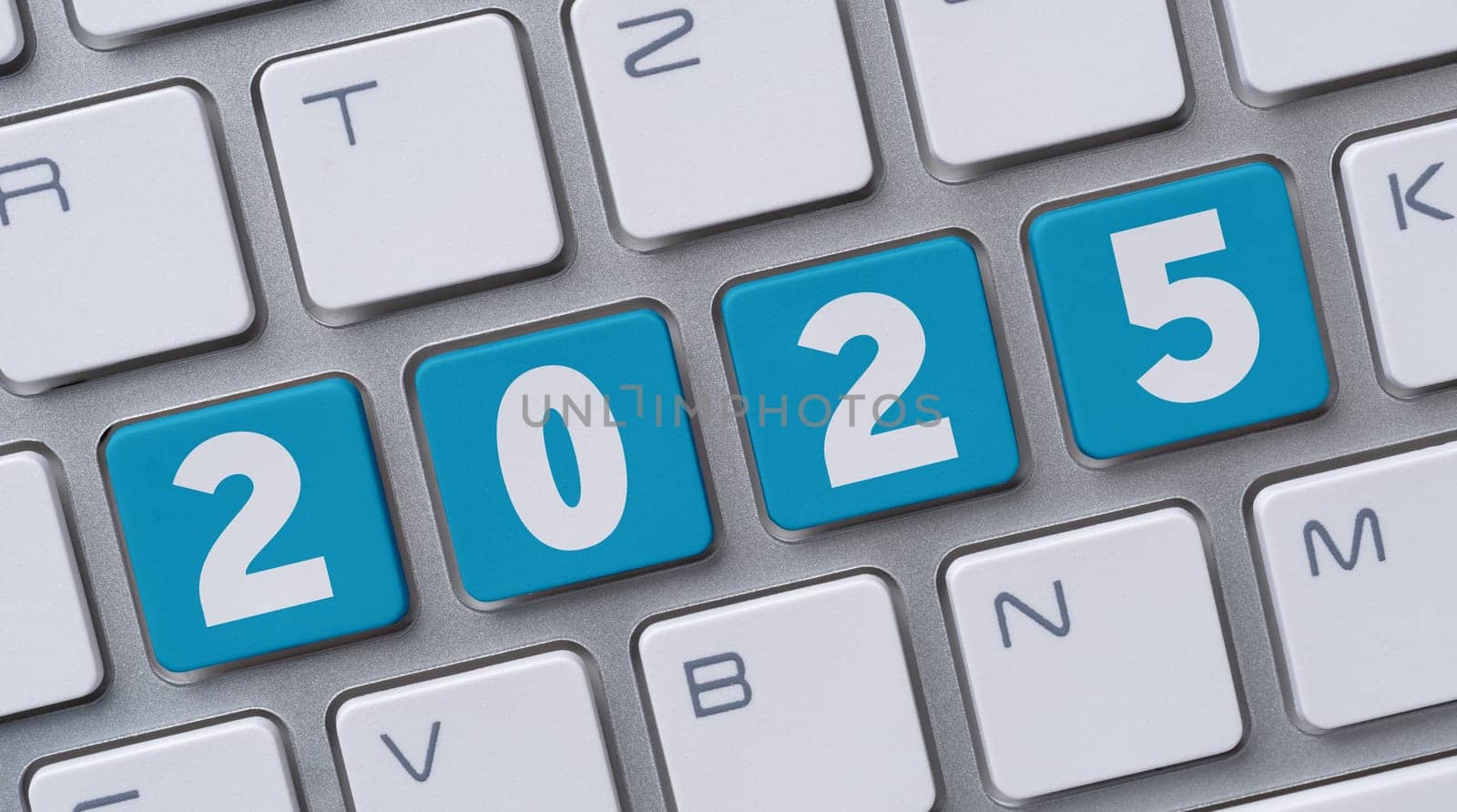 A computer keyboard with the number 2025
