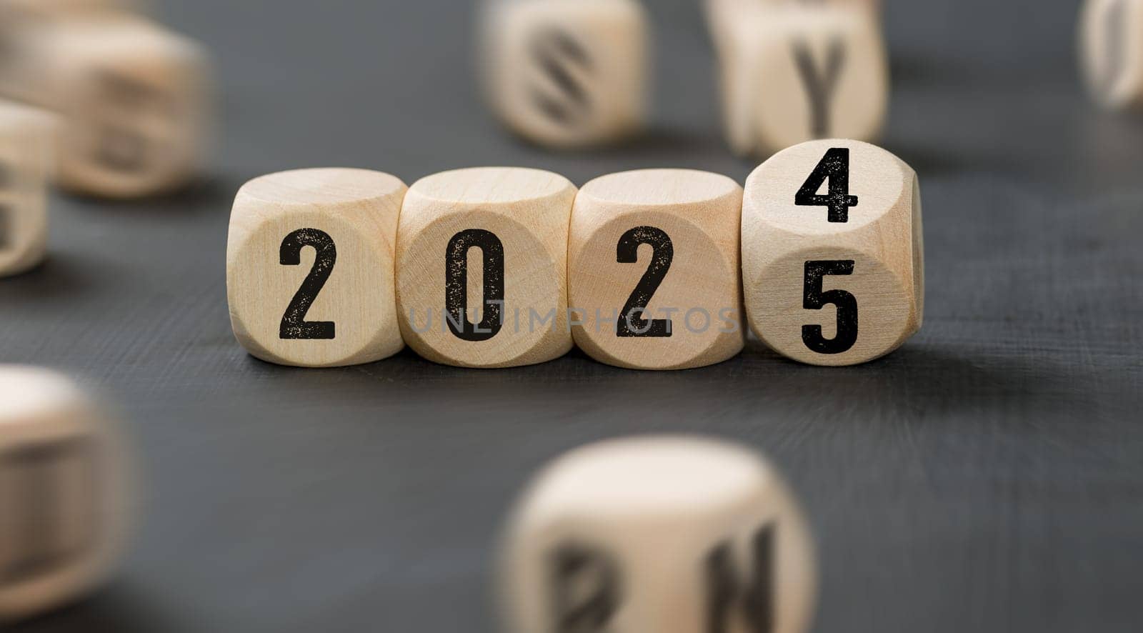Letter dice with the number 2024 and 2025