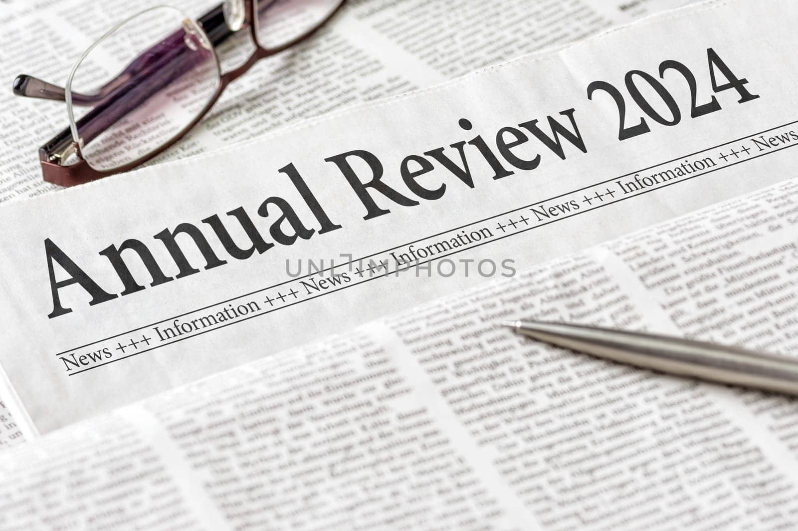 A newspaper with the headline Annual review 2024